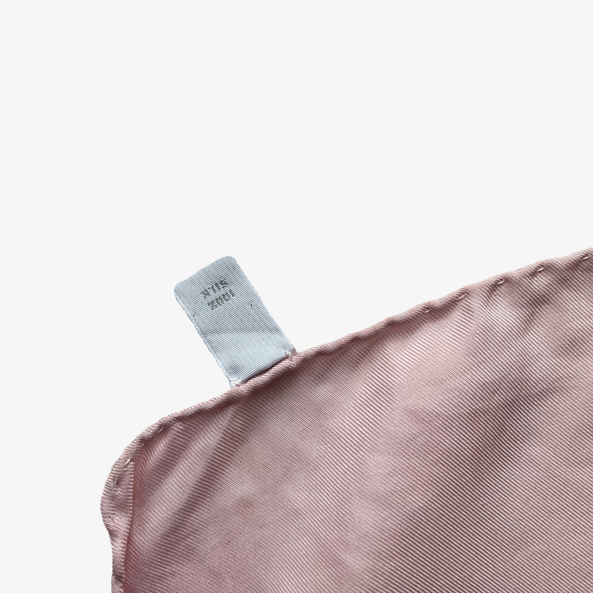 Hand rolled edges of women's vintage Y2K Burberry polka dot and spell out logo print pink silk scarf.