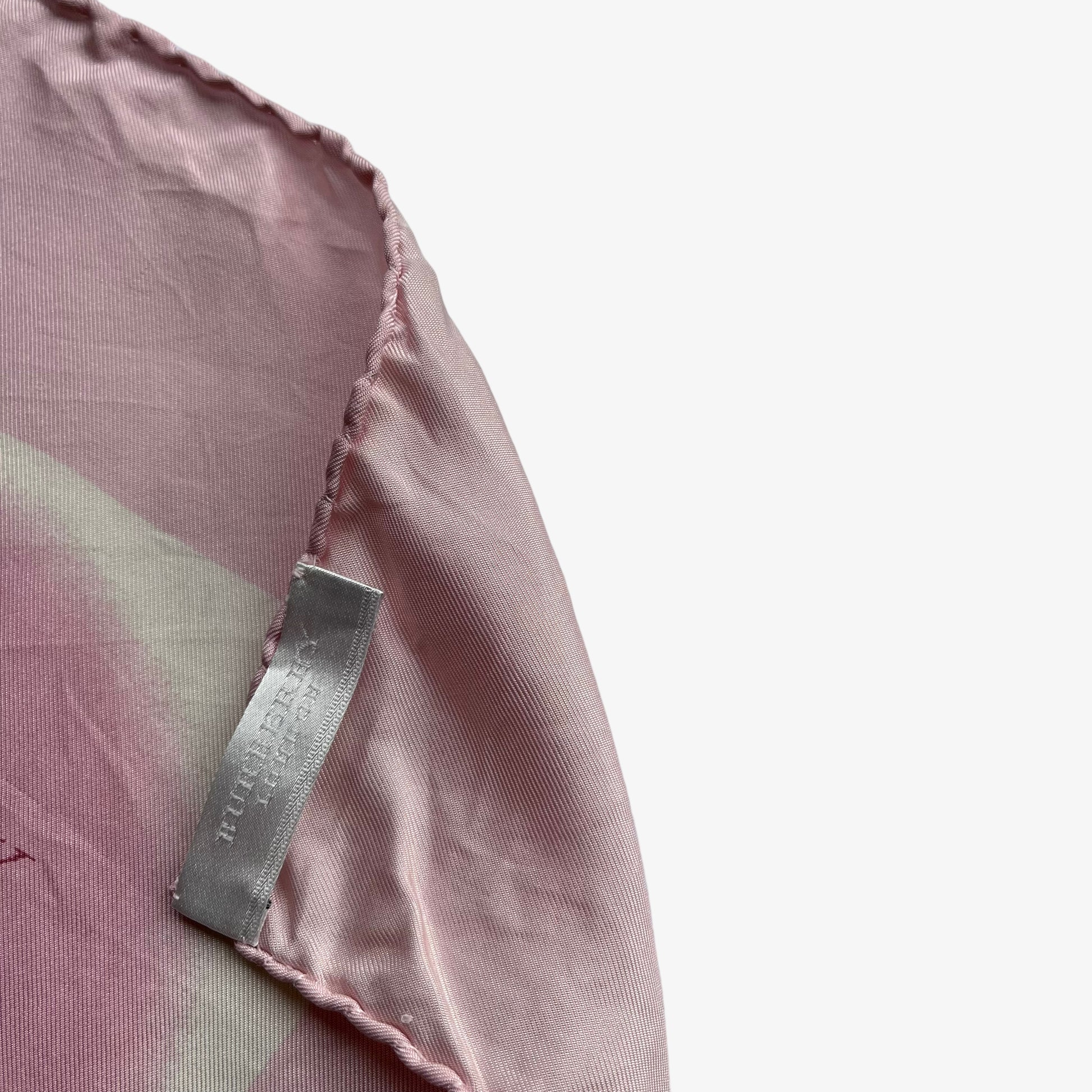 Burberry label on women's vintage Y2K polka dot and spell out logo print pink silk scarf.