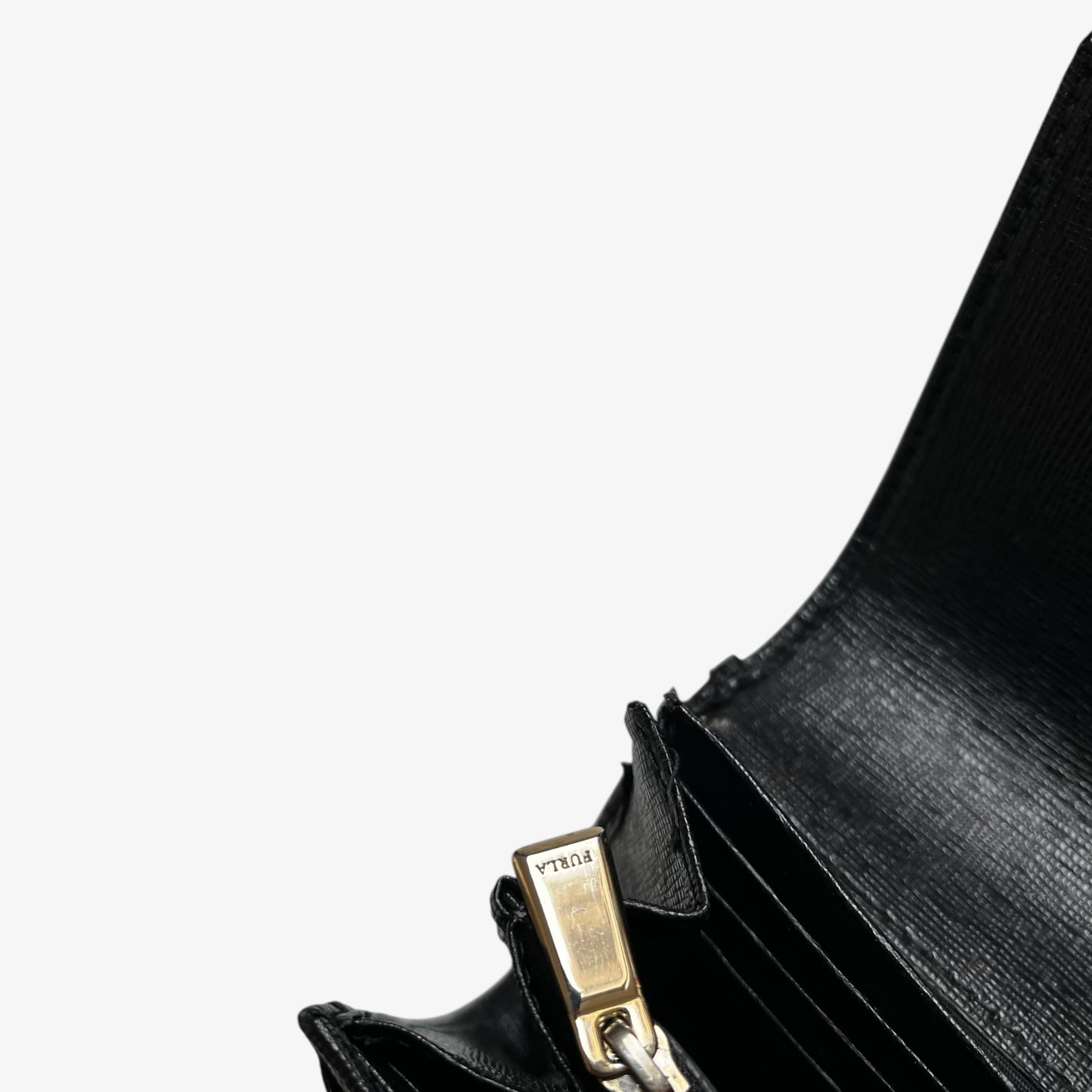 Furla engraved zipper inside of a vintage Y2K black leather continental flap wallet.