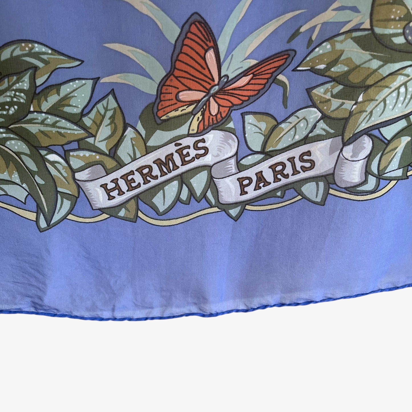Hermes Paris logo on vintage Y2K jungle love leopard print blue silk scarf.