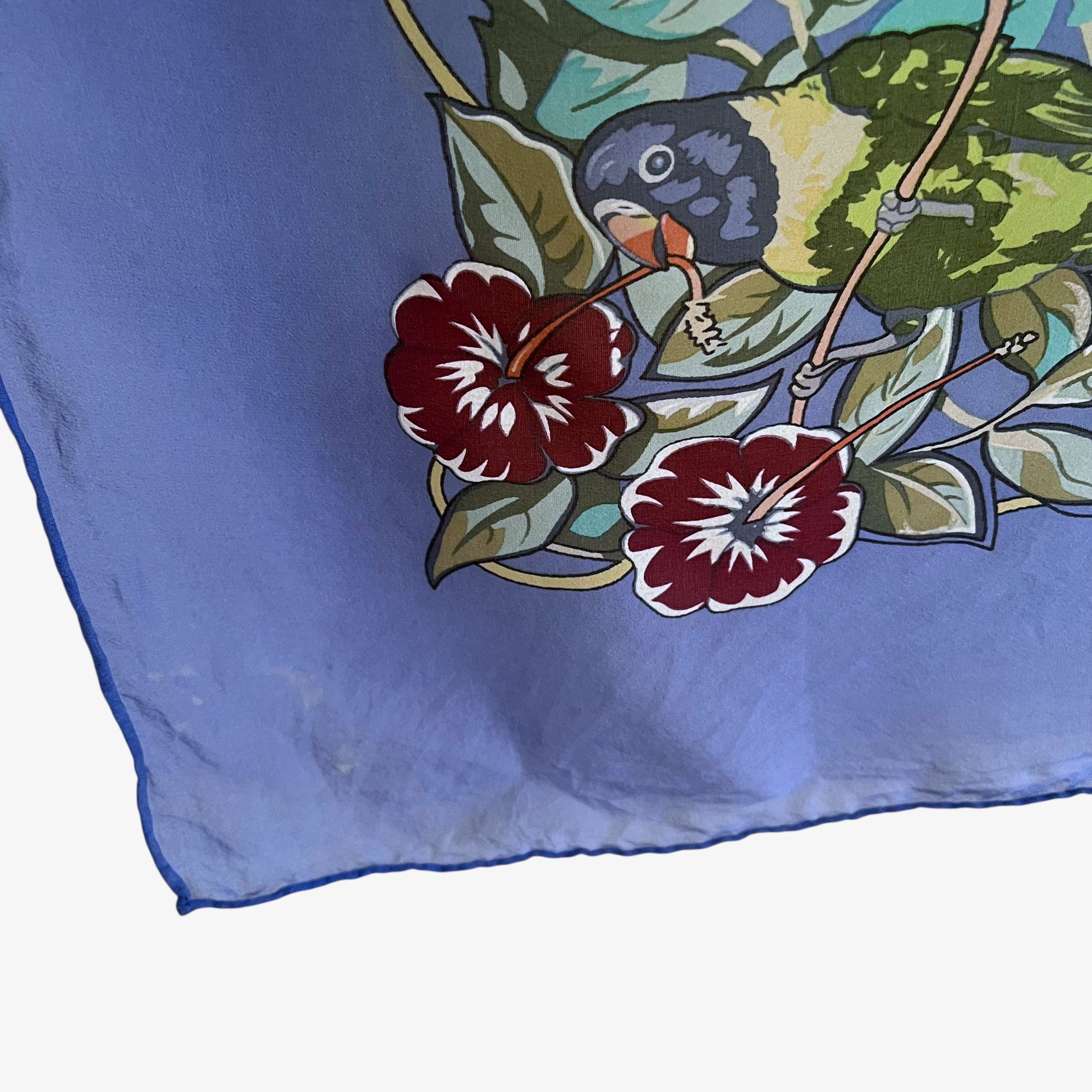 Scuff on vintage Y2K Hermes jungle love leopard print blue silk scarf.