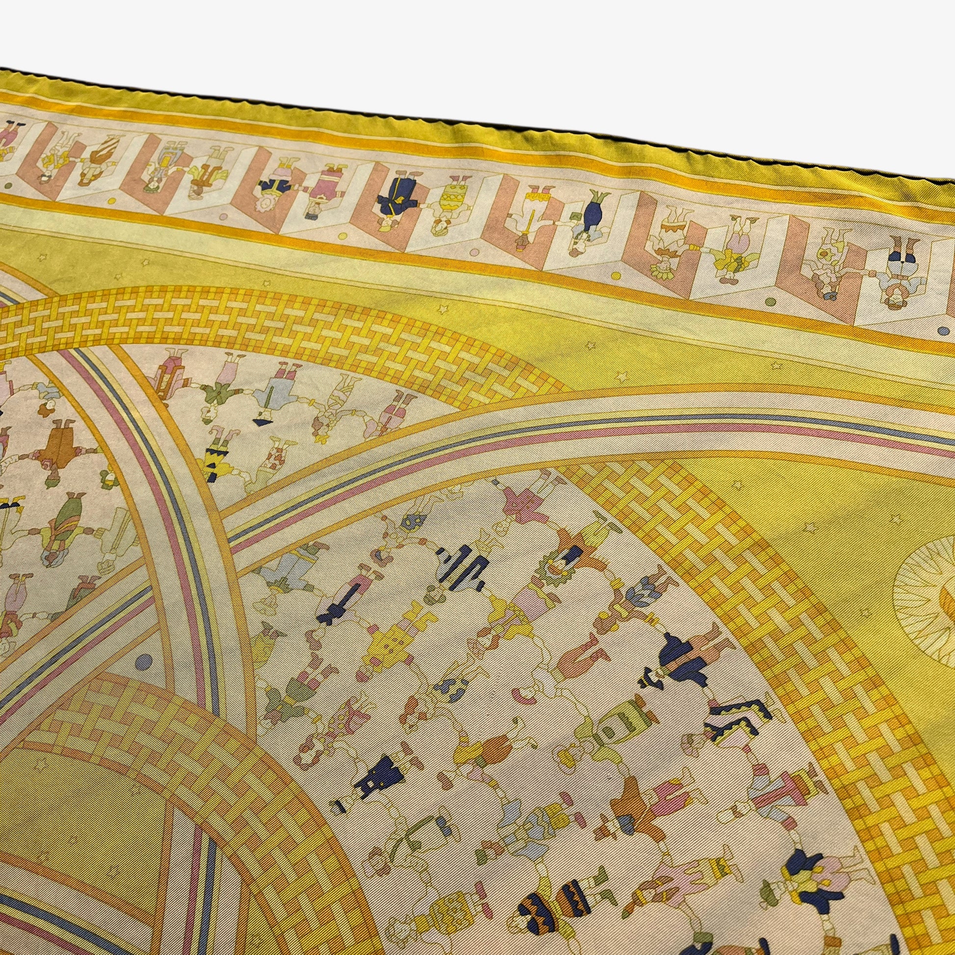 Geometric human pattern on vintage Y2K women's Hermes Paris Donner La Main geometric sun face print yellow silk scarf.