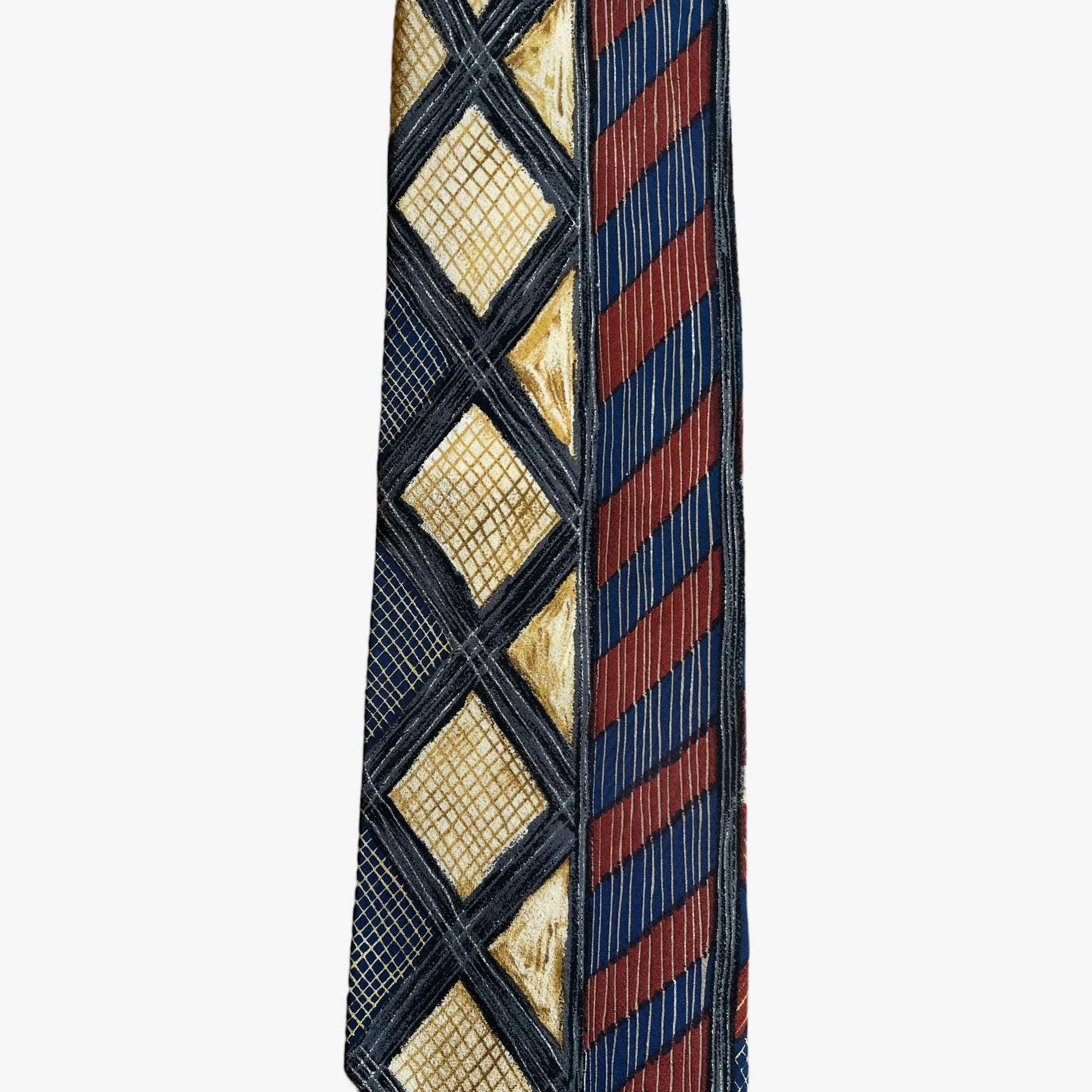 Contrasting colourful striped and checkered pattern on a vintage Y2K Hugo Boss silk tie.