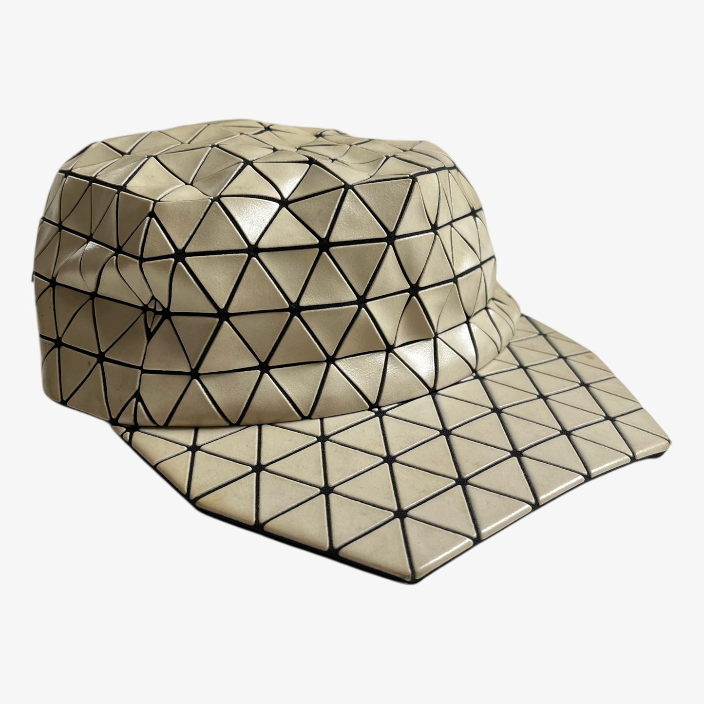 Vintage Y2K Issey Miyake bao bao beige geometric cap.