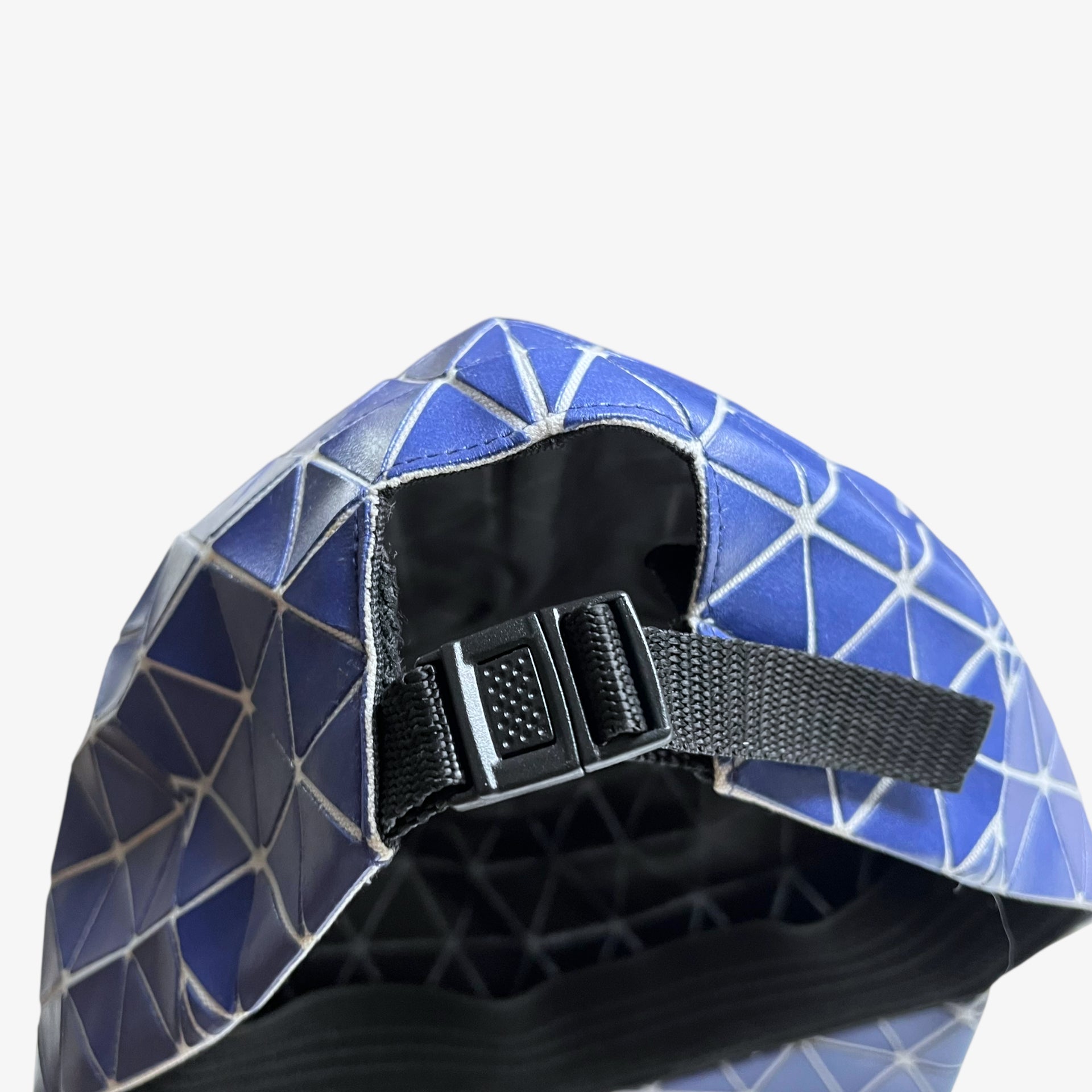 Adjustable strap of vintage Y2K Issey Miyake bao bao blue geometric cap.
