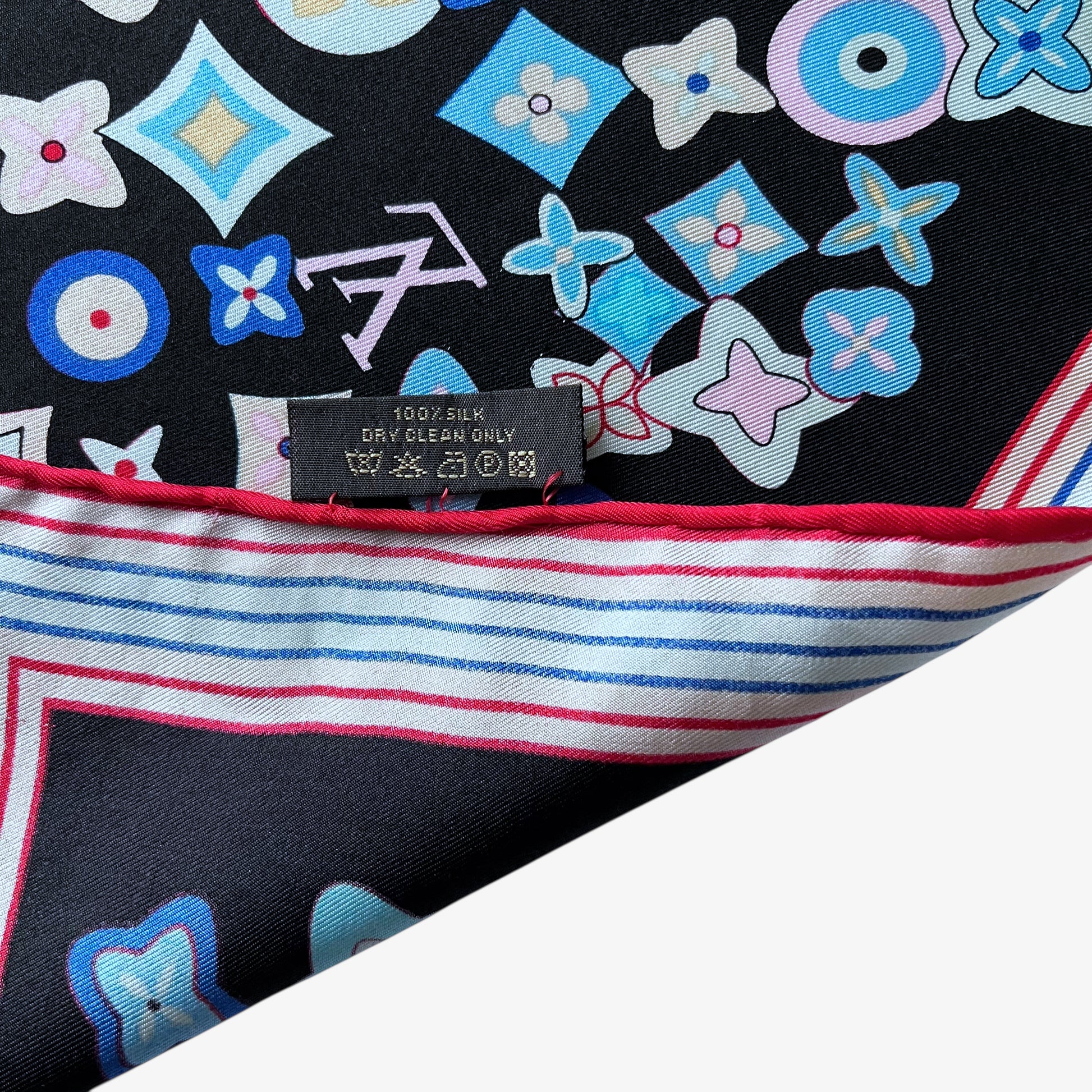 Hand rolled edge of Vintage Y2K women's Louis Vuitton black silk scarf features a colourful LV and abstract floral geometric print.