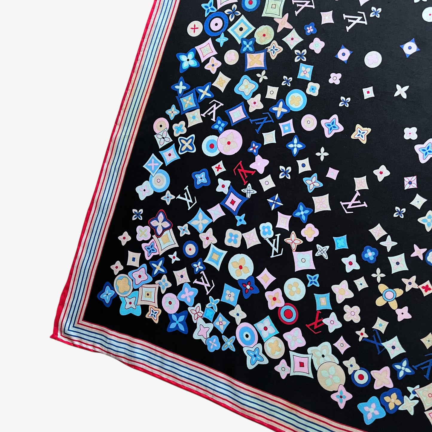 Takashi Murakami styled geometric pattern on a vintage Y2K women's Louis Vuitton black silk scarf features a colourful LV and abstract floral print.