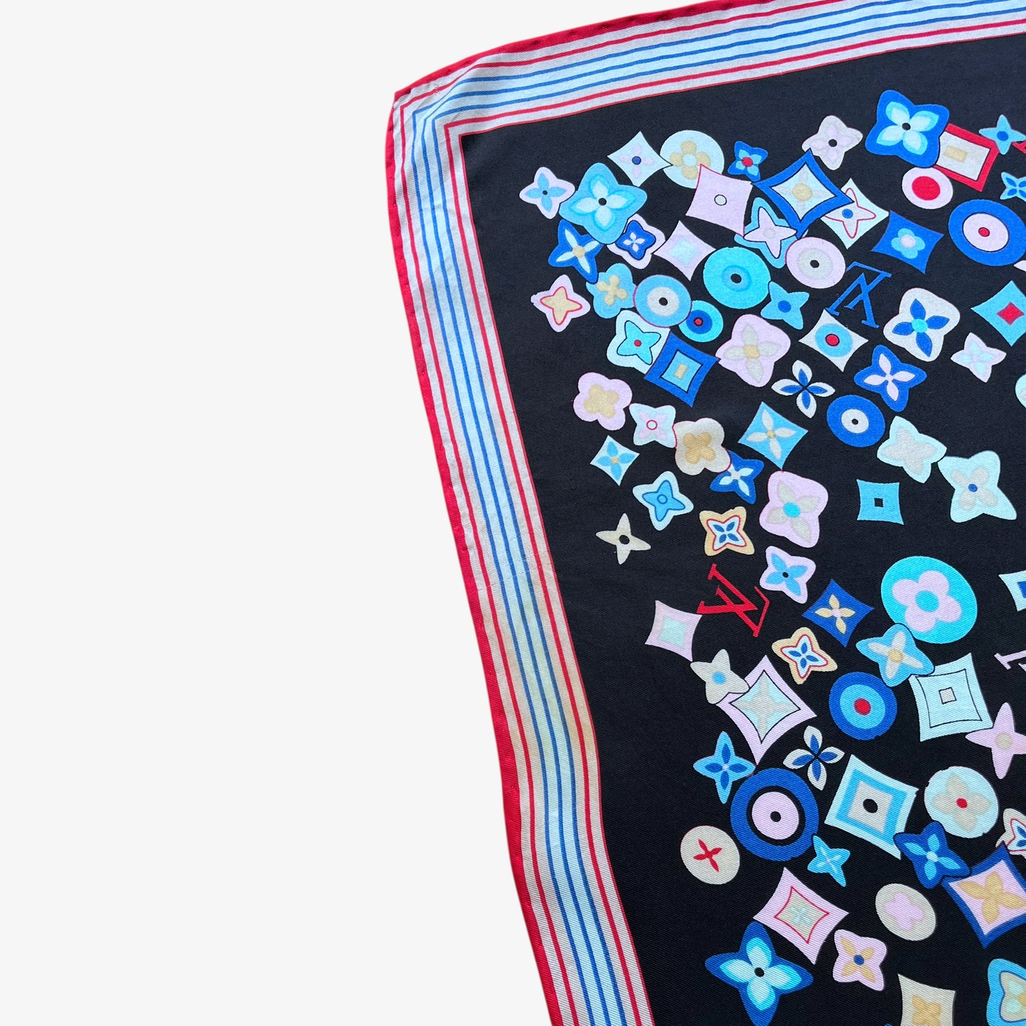 Colourful border of vintage Y2K women's Louis Vuitton black silk scarf features a colourful LV and abstract floral geometric print.