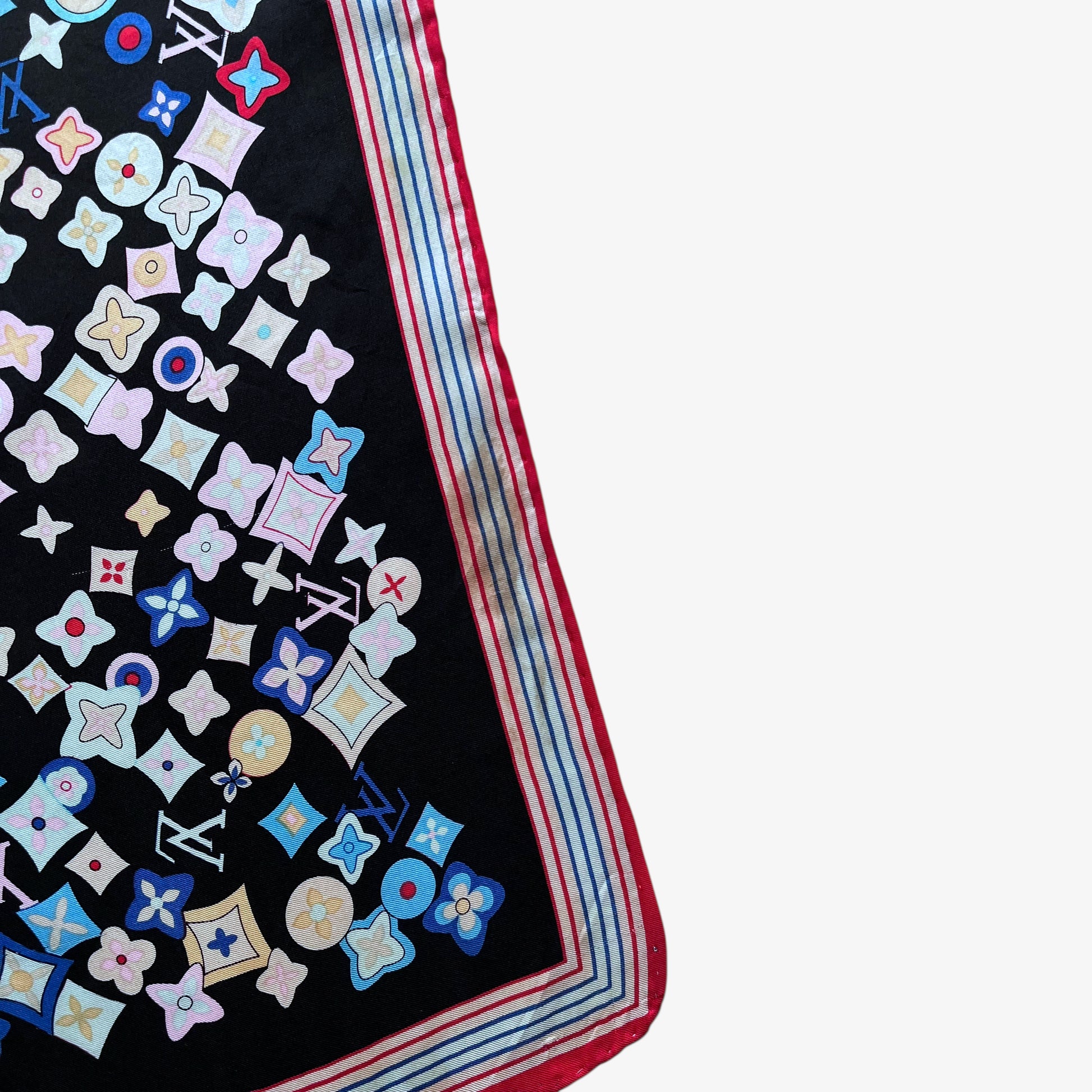 Slight brown marking in the corner of vintage Y2K women's Louis Vuitton black silk scarf features a colourful LV and abstract floral geometric print.