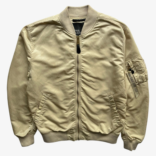 Vintage Y2K men's Alpha Industries beige bomber jacket.