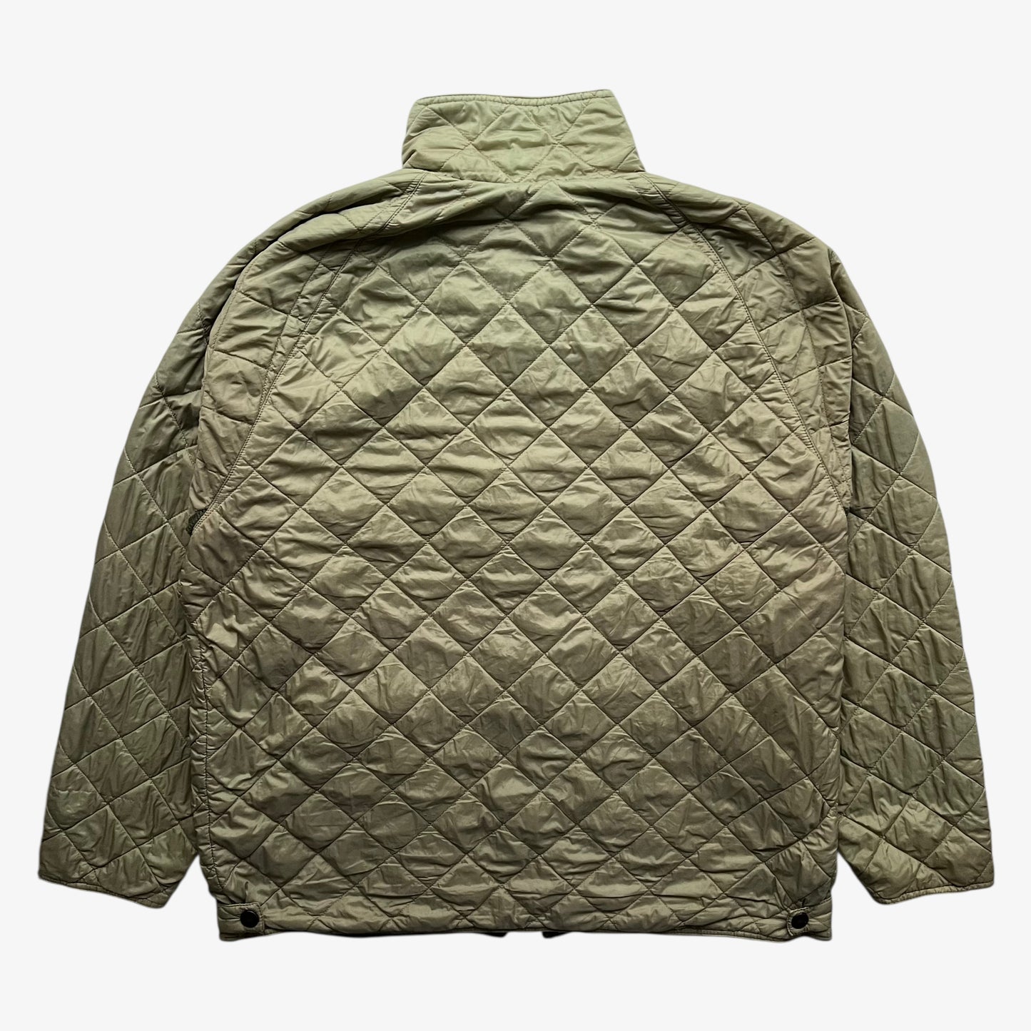 Back of vintage Y2K men's Barbour lime green quilted jacket.