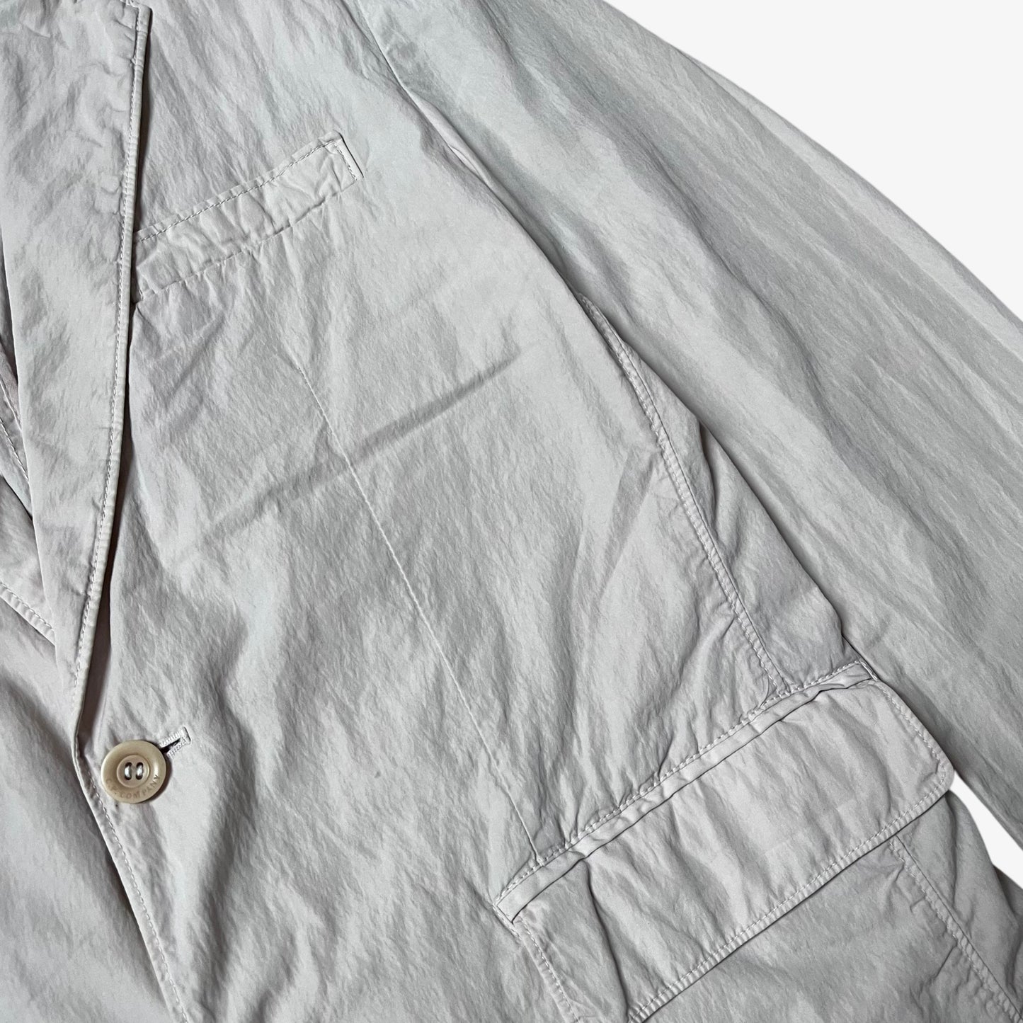 Patina on vintage Y2K men's CP Company cream single breasted blazer.