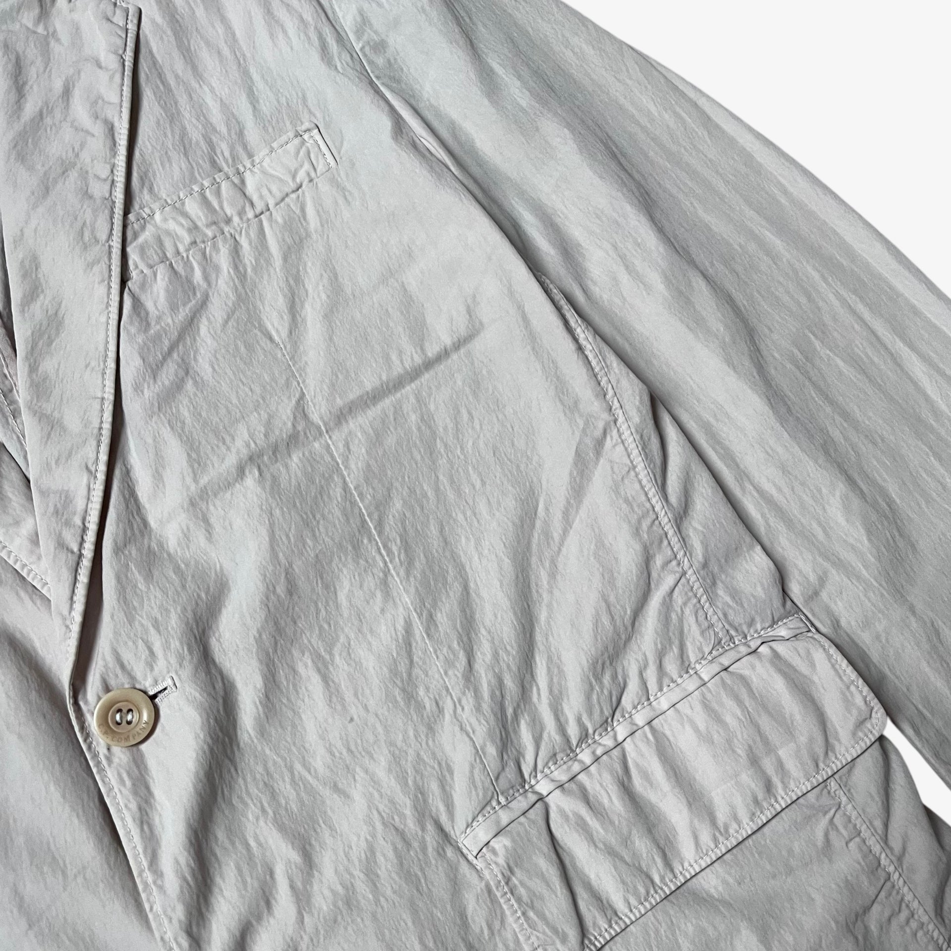 Patina on vintage Y2K men's CP Company cream single breasted blazer.