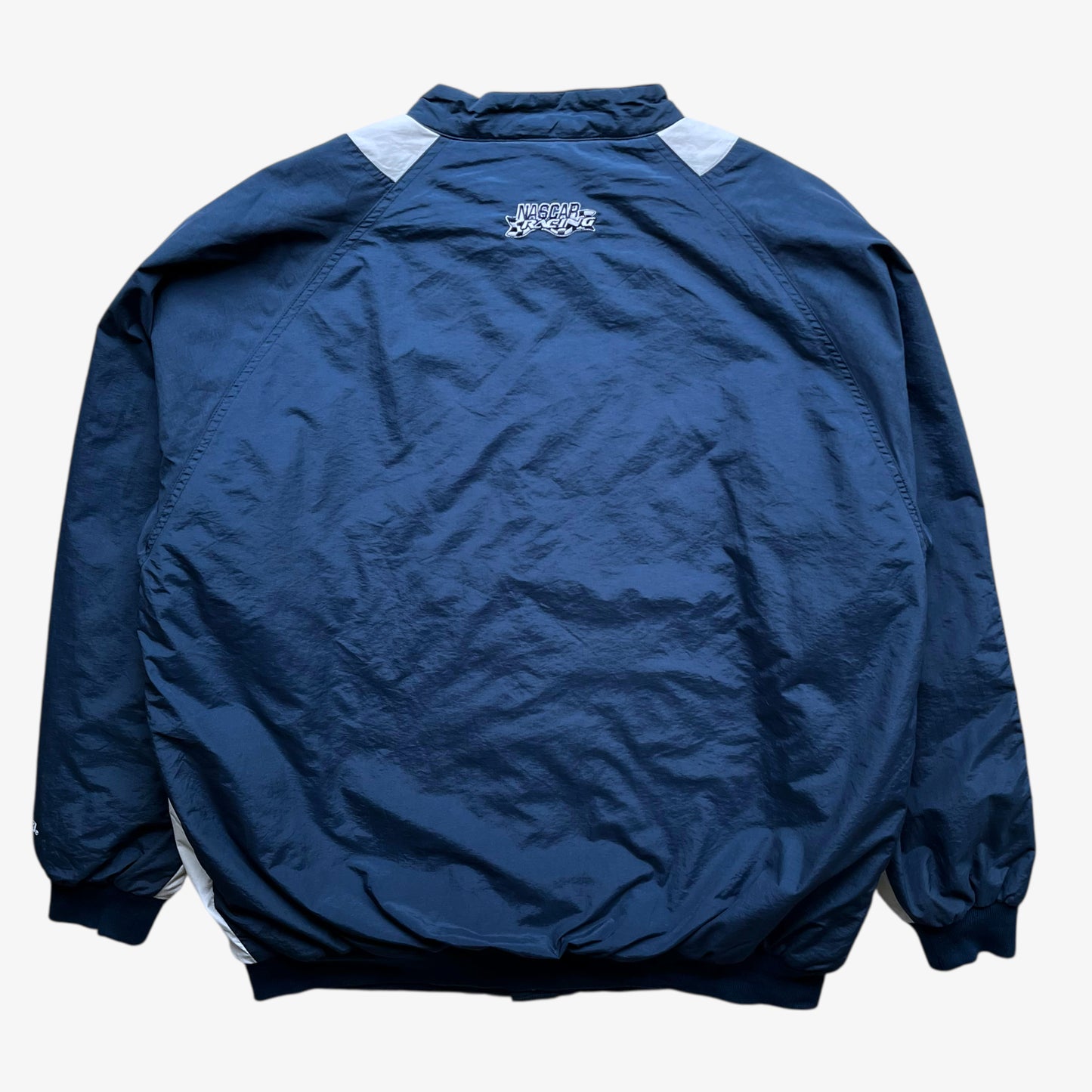 Back of men's vintage Y2K Chase Authentics 2005 team nascar blue jacket.