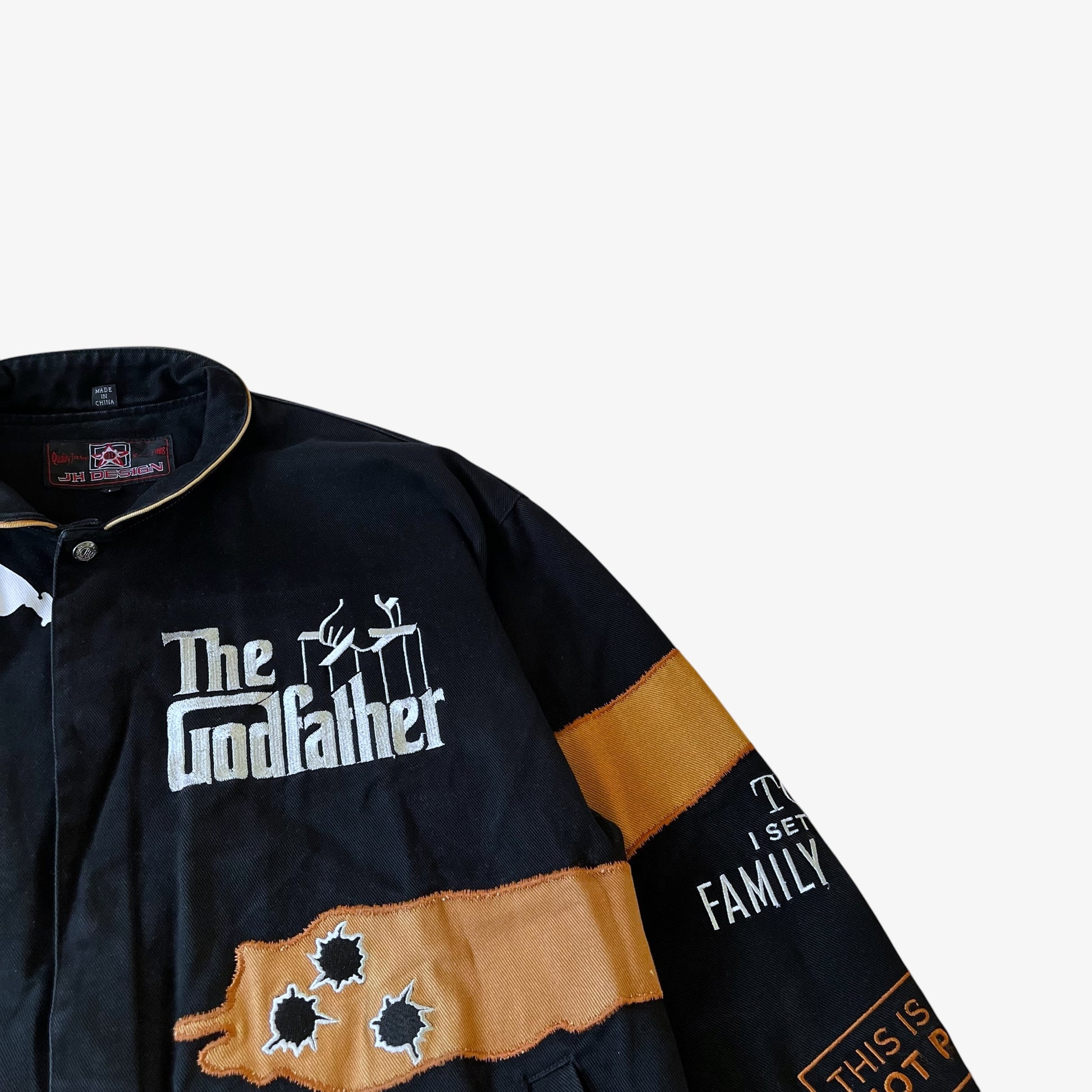 Embroidered bullet holes on a vintage Godfather Jeff Hamilton jacket.