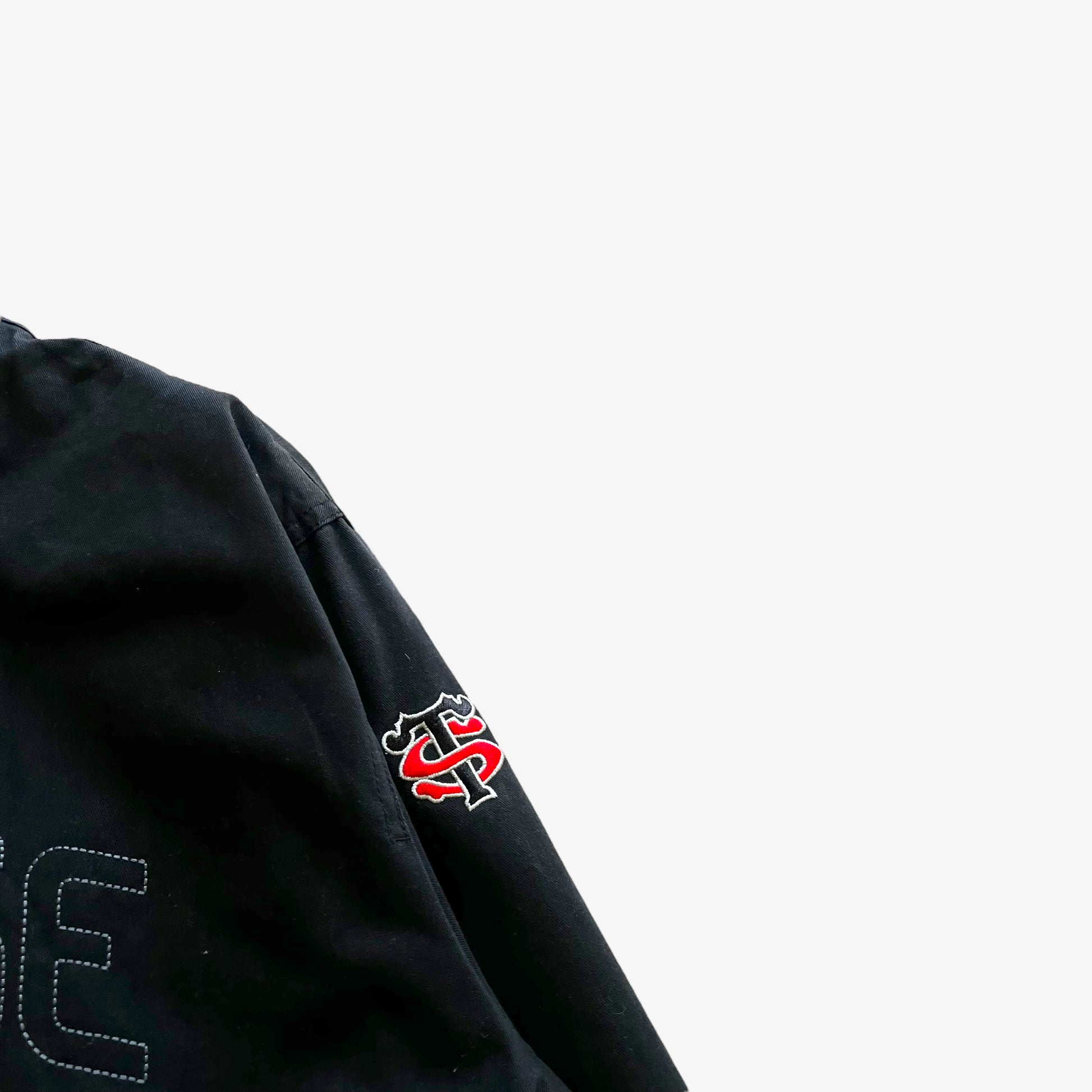 Vintage Y2K Mens Nike Stade Toulousain Rugby Team Embroidered Toulouse Spell Out Black Varsity Jacket Badge - Casspios Dream