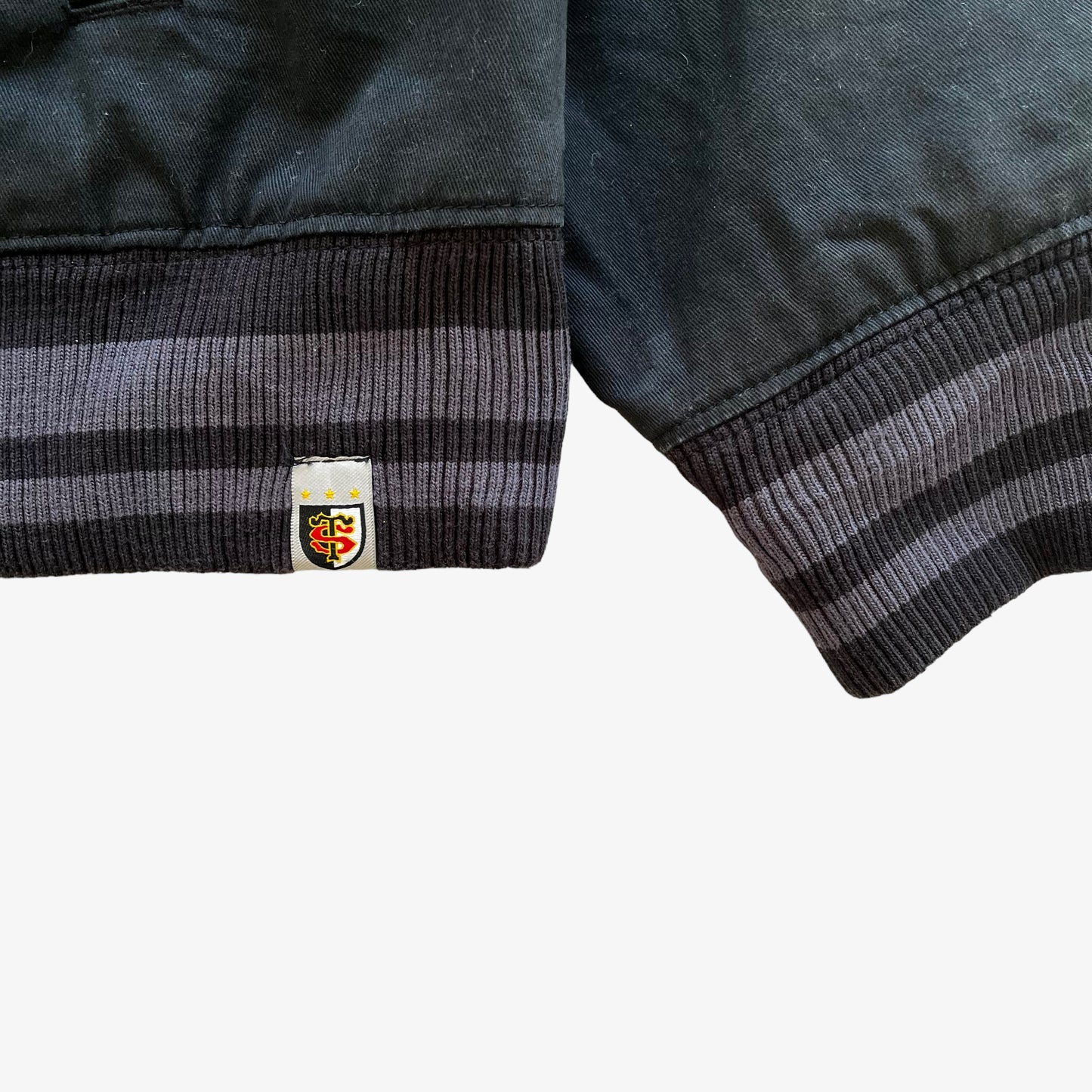 Vintage Y2K Mens Nike Stade Toulousain Rugby Team Embroidered Toulouse Spell Out Black Varsity Jacket Tag - Casspios Dream