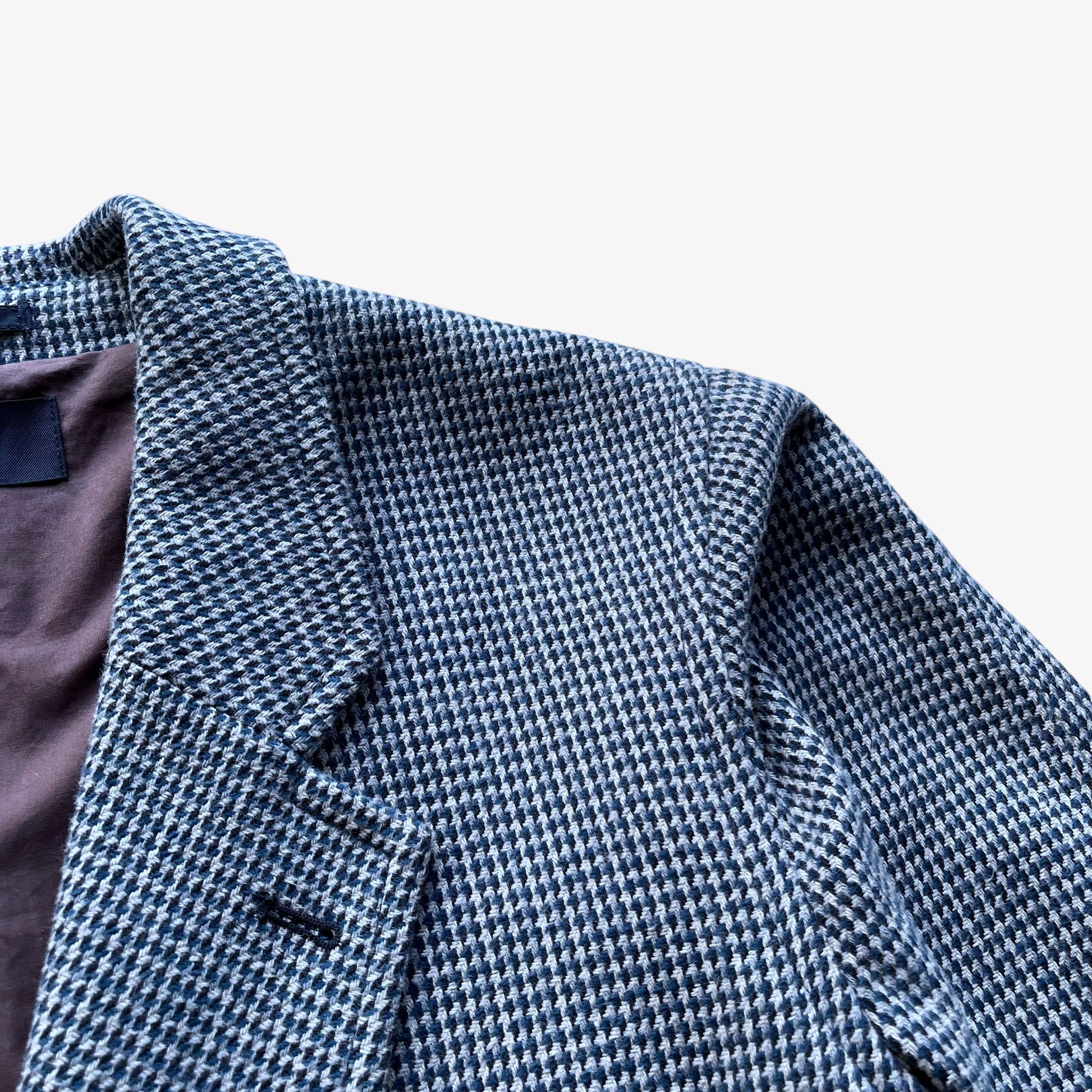Blue and grey houndstooth print of vintage Y2K men's Paul Smith jeans double breasted coat.