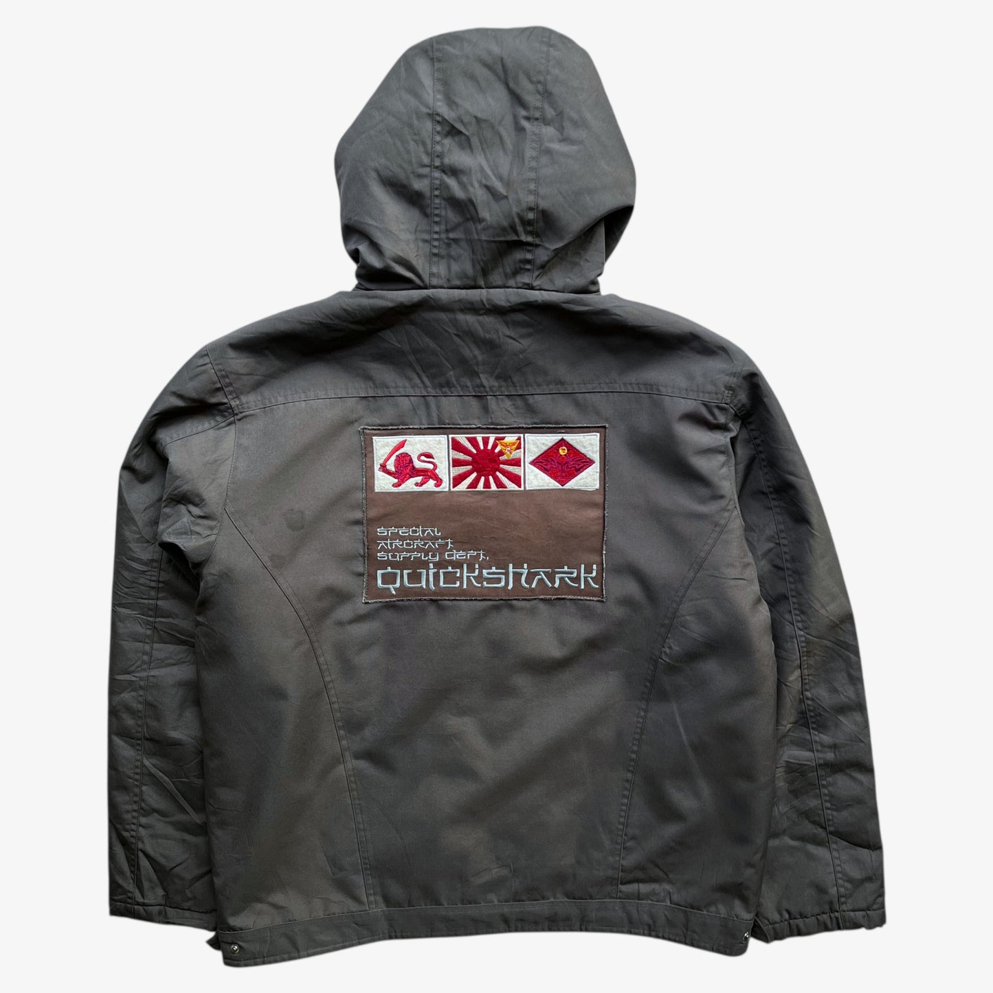 Back of men's vintage Y2K Quickshark special aircraft supply grey utility jacket with spell out.