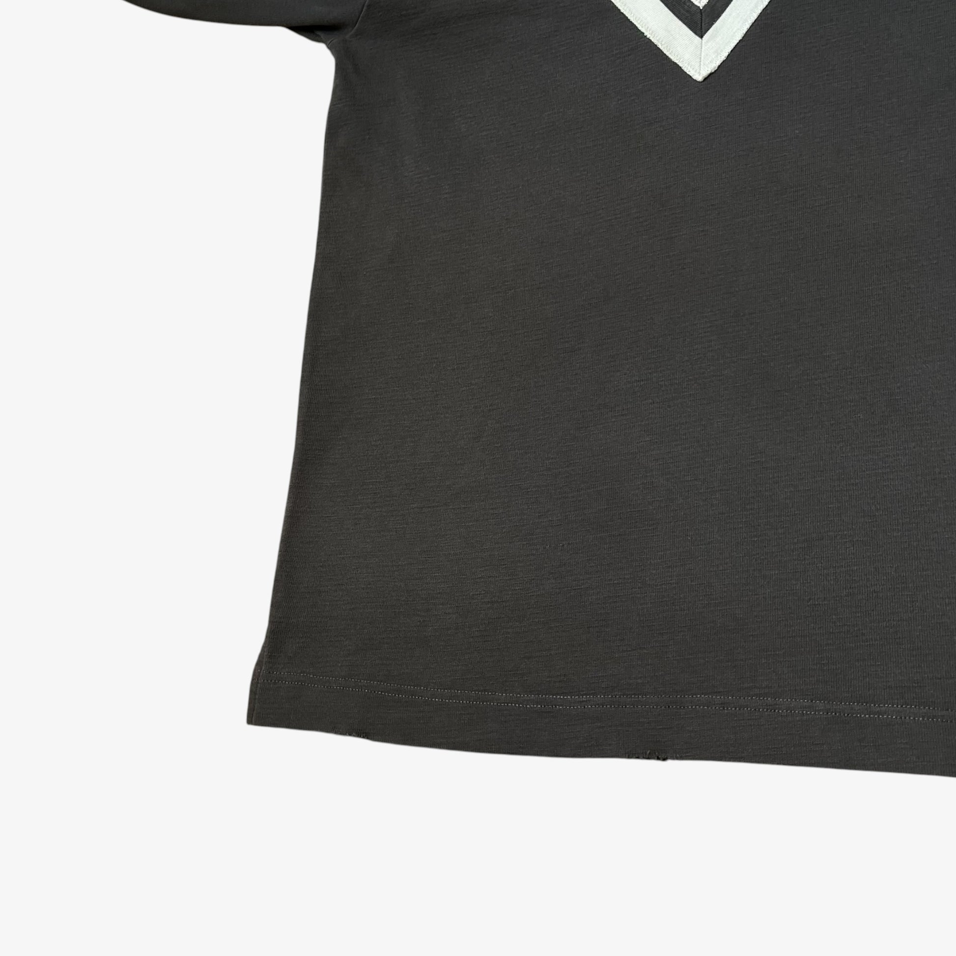 Wear on vintage Y2K men's Ralph Lauren grey rugby jersey.