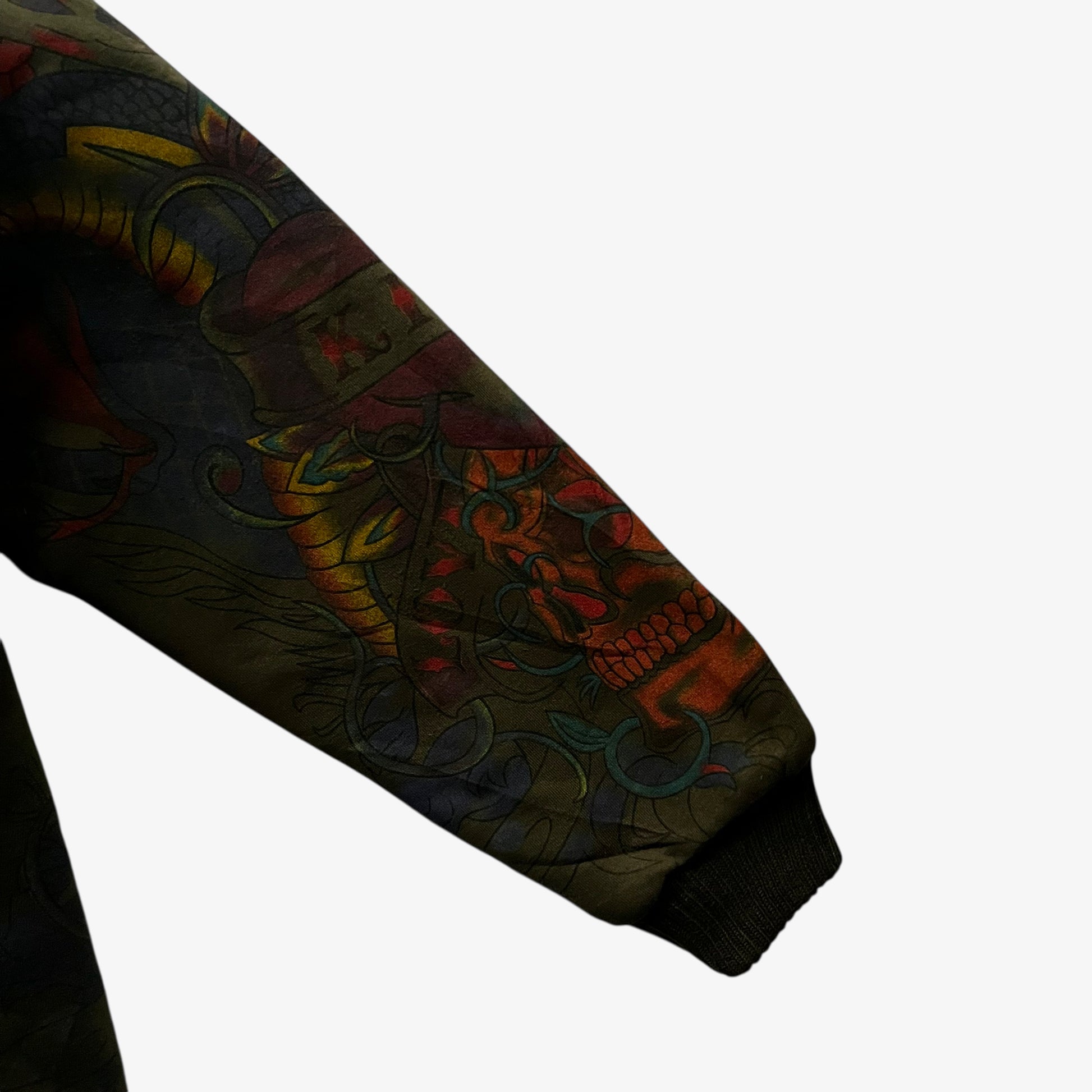 Skull pattern on the sleeve of vintage Y2K men's Really Point cobra snake double sided print green hooded jacket.