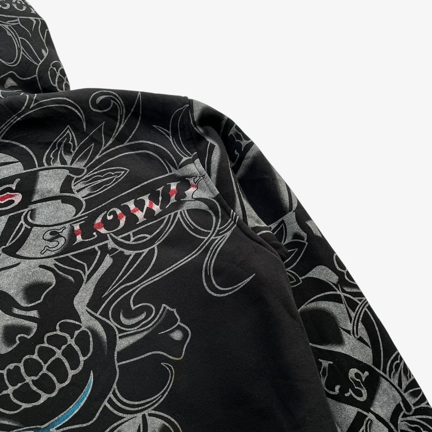 Back pattern of vintage Y2K men's Really Point love kills skull double sided print black jacket.
