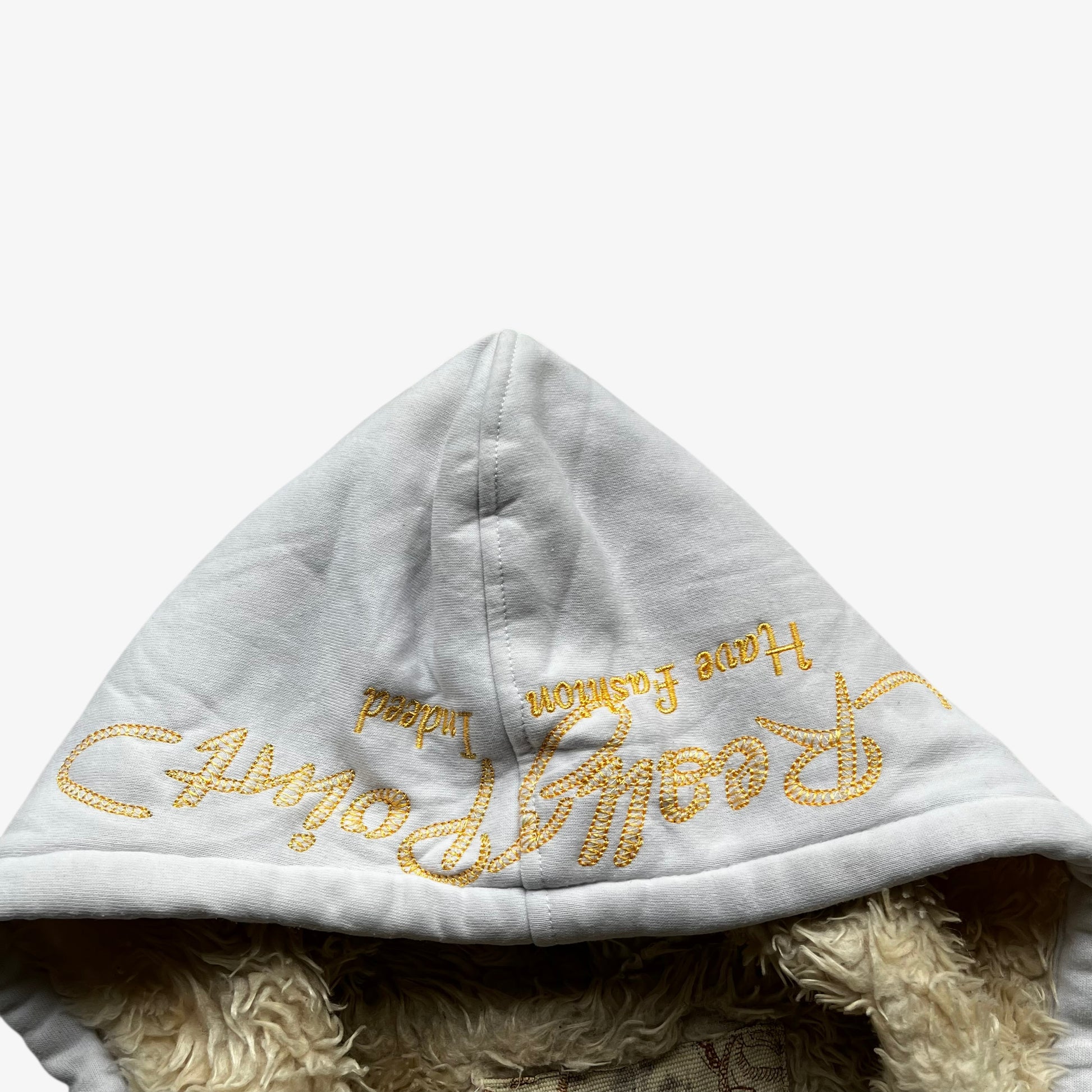 Embroidered spell out on hood of vintage Y2K men's Really Point skull and snake double sided print white jacket with sherpa lining.