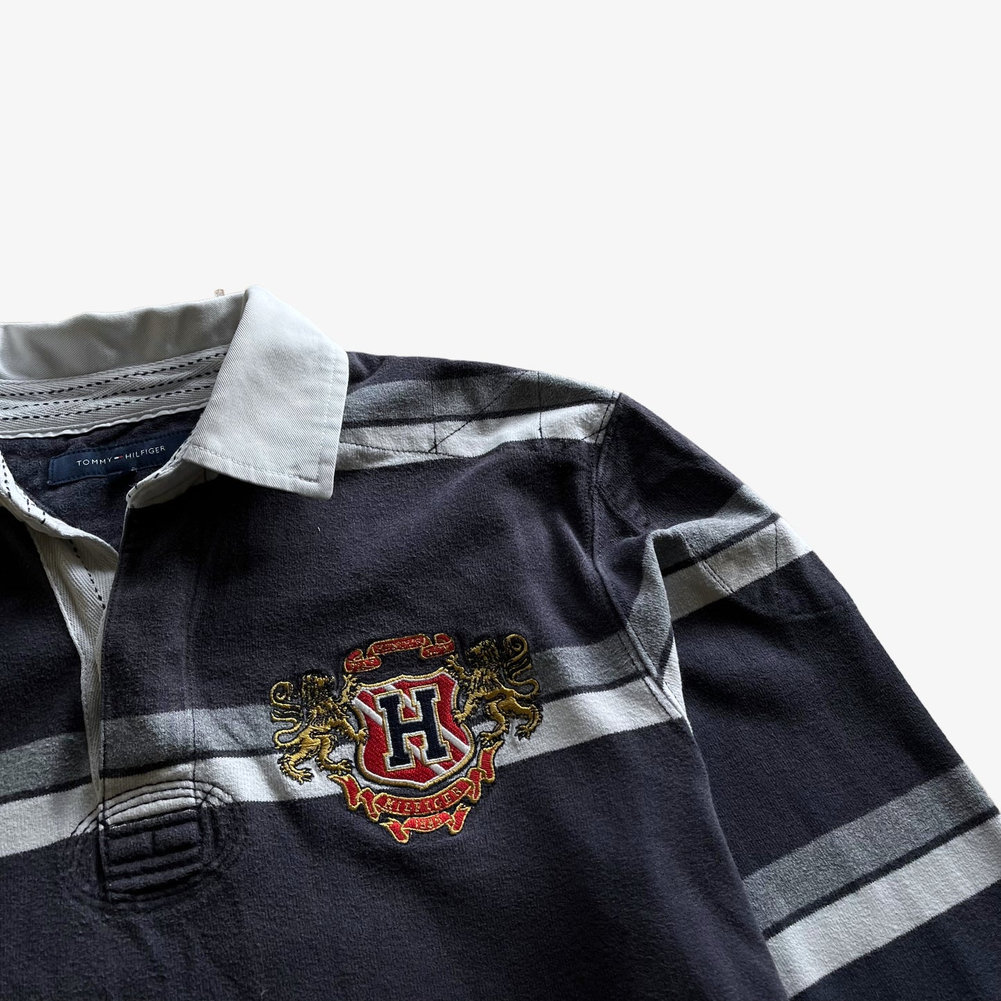 Vintage Y2K Mens Tommy Hilfiger Navy And White Striped Rugby Shirt With Embroidered Crest Logo - Casspios Dream