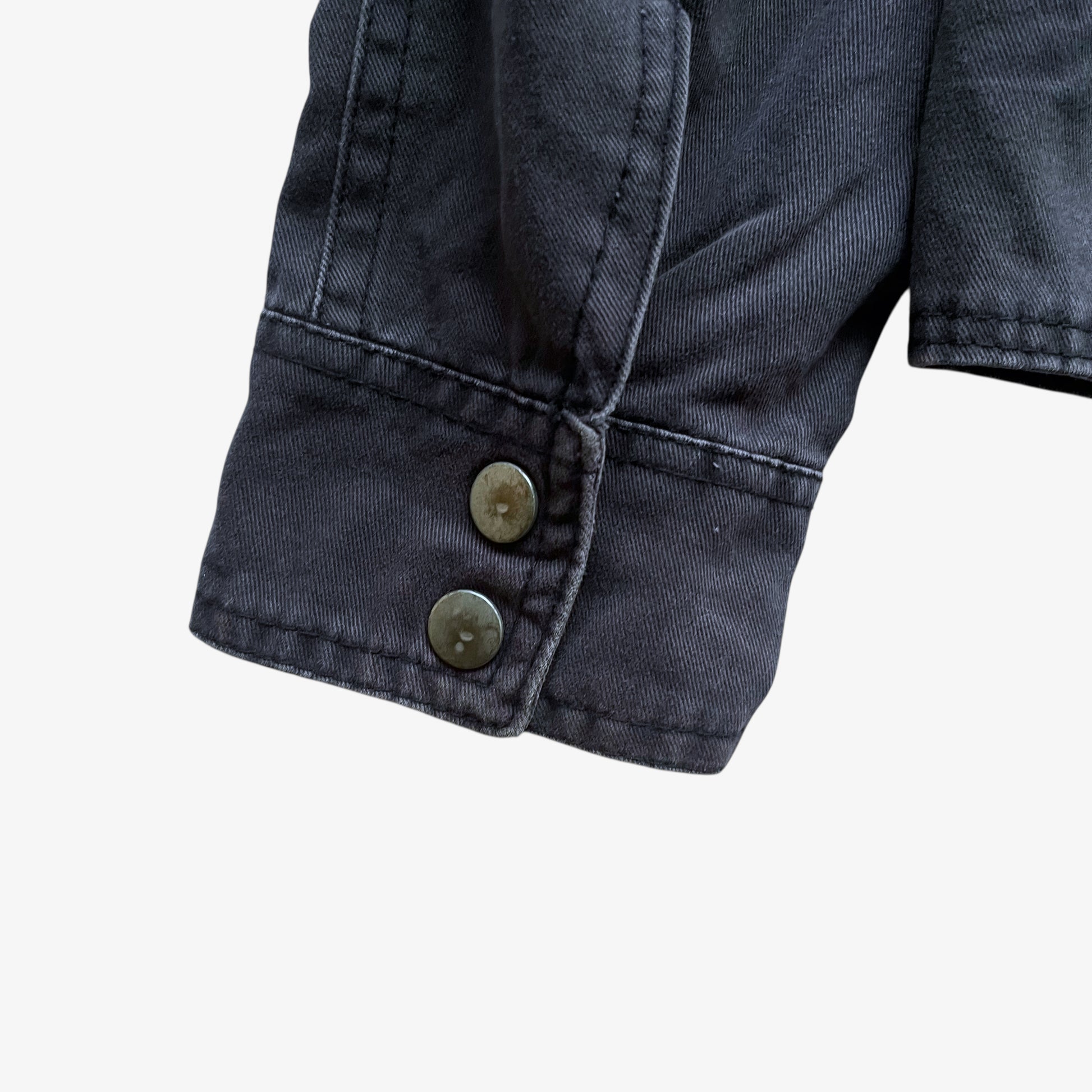 Patina on vintage Y2K men's US Army 3D E87 faded navy utility jacket.