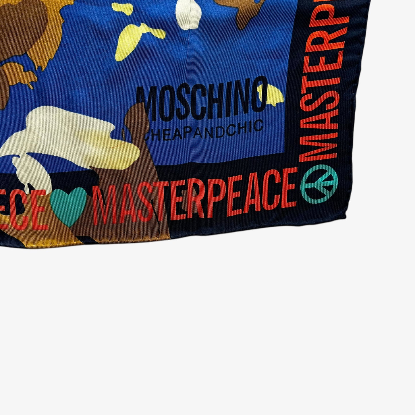 Moschino cheap and chic spell out logo on women's vintage Y2K abstract master peace sign and heart oil painting print blue silk scarf.