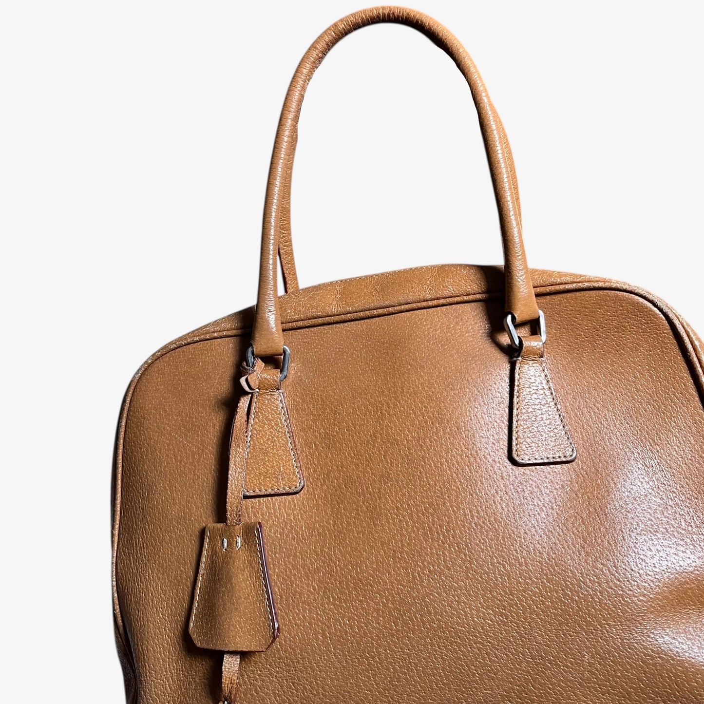 Wear on vintage Y2K Prada Cinghiale sport brown leather Bauletto shoulder bag.