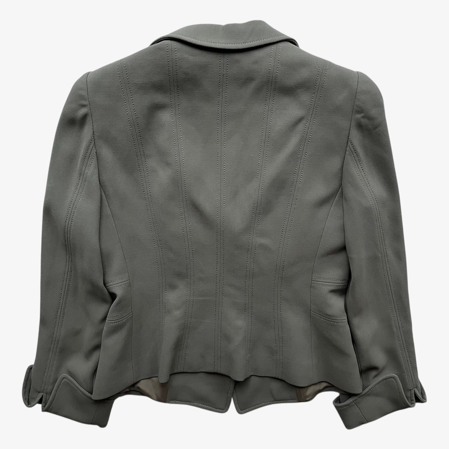 Back of a vintage Y2K women's Armani Collezioni grey single breasted blazer on a white background.