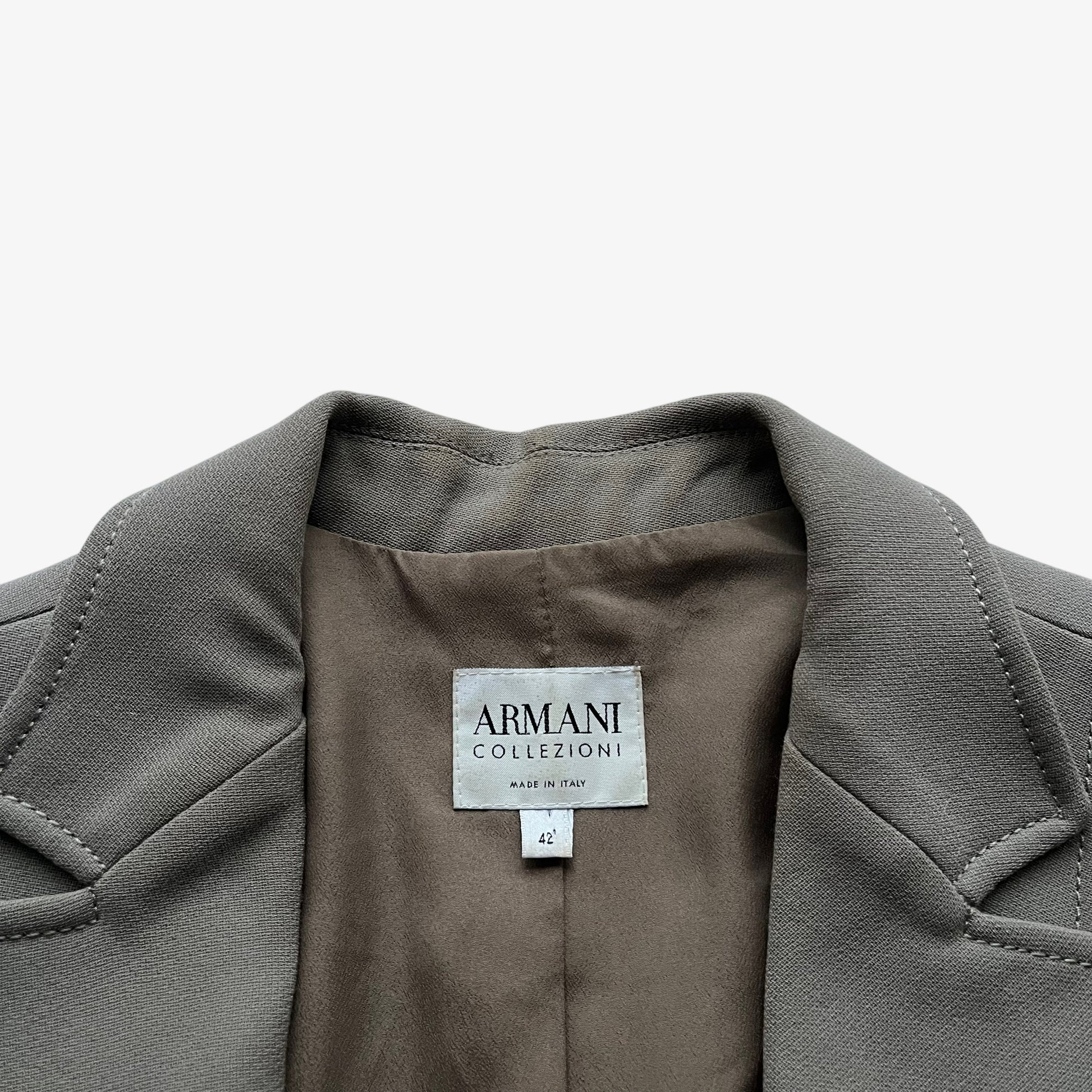 Vintage Y2K Armani Collezioni label stitched inside of a women's grey single breasted blazer.