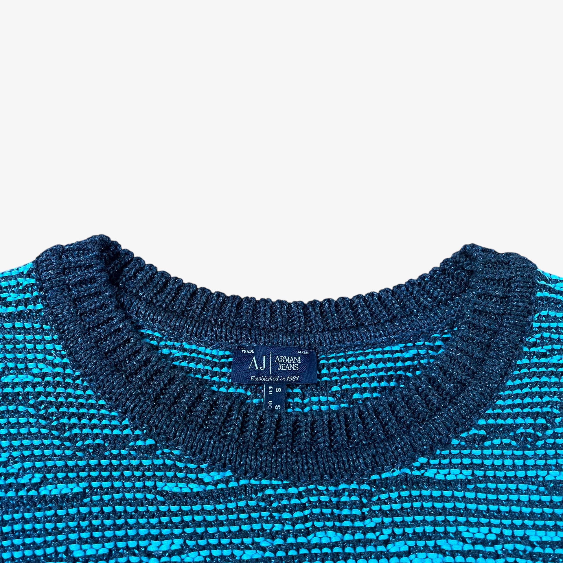 Label of vintage Y2K Armani Jeans women’s blue knitted short sleeve top.