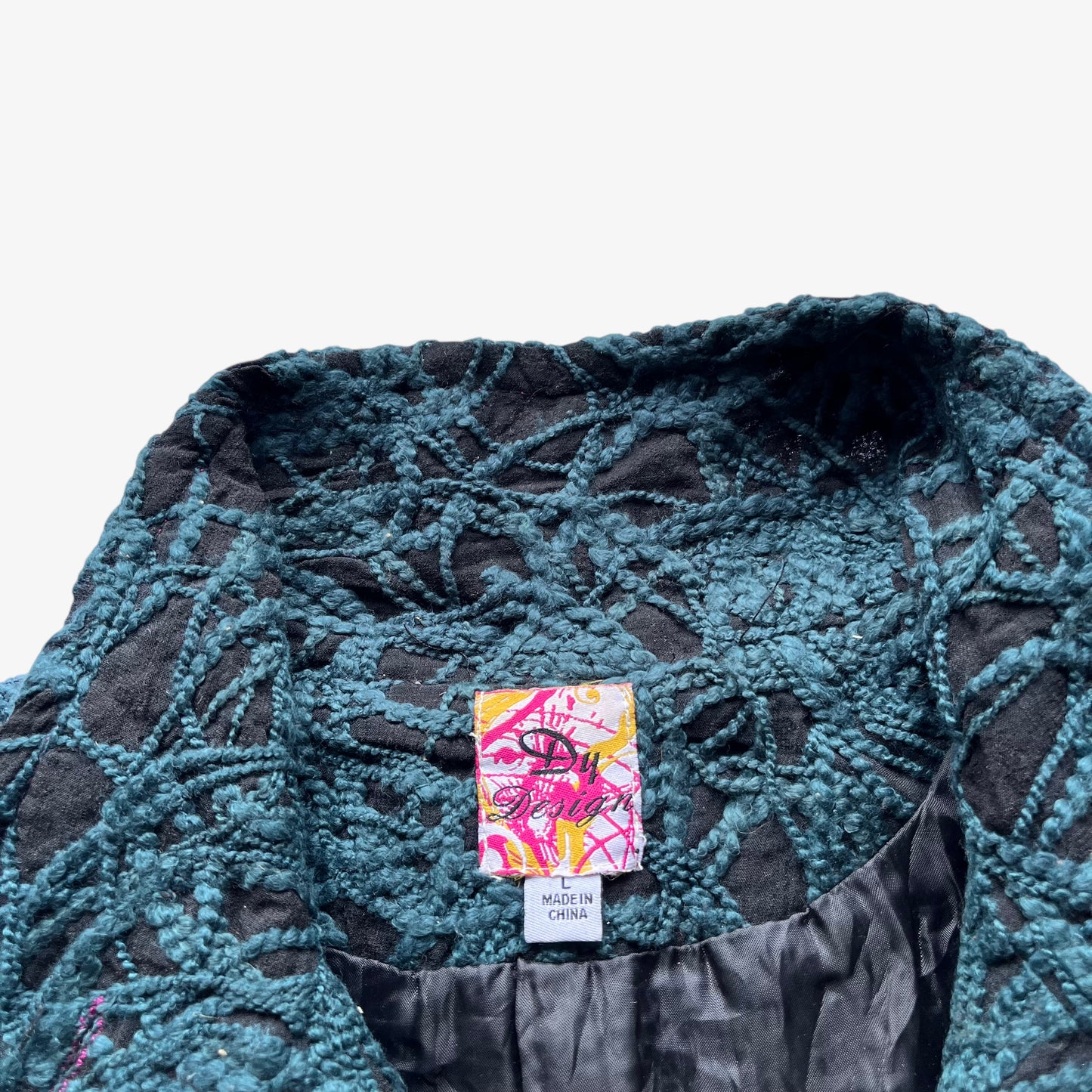 Desigual label stitched inside of vintage Y2K women's abstract floral embroidered green coat.