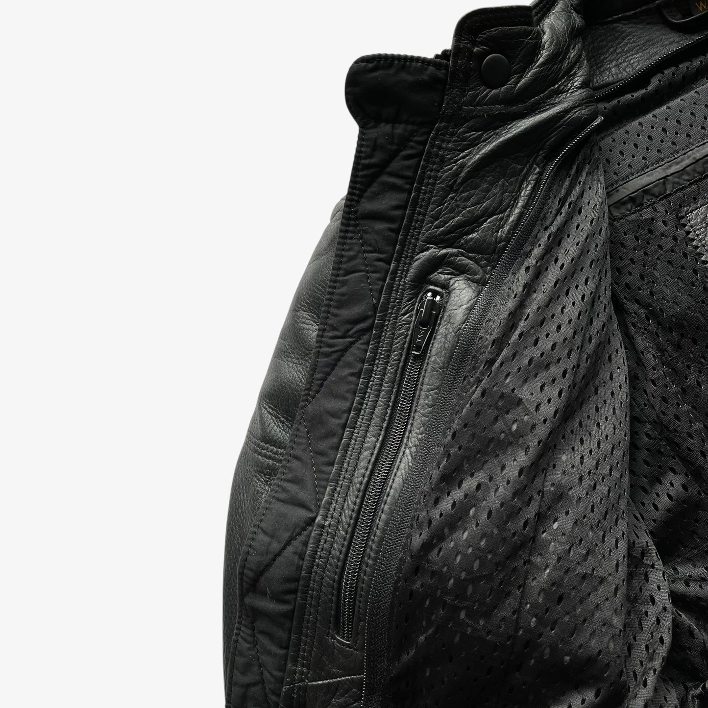 Inside zip pocket of vintage Y2K women's Harley Davidson FXRG Series 1 padded black leather biker jacket.