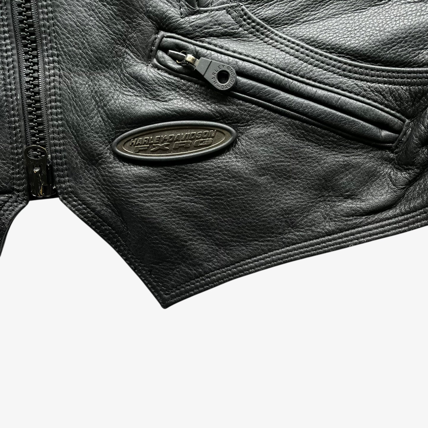 Harley Davidson FXRG logo on vintage Y2K women's Series 1 padded black leather biker jacket.