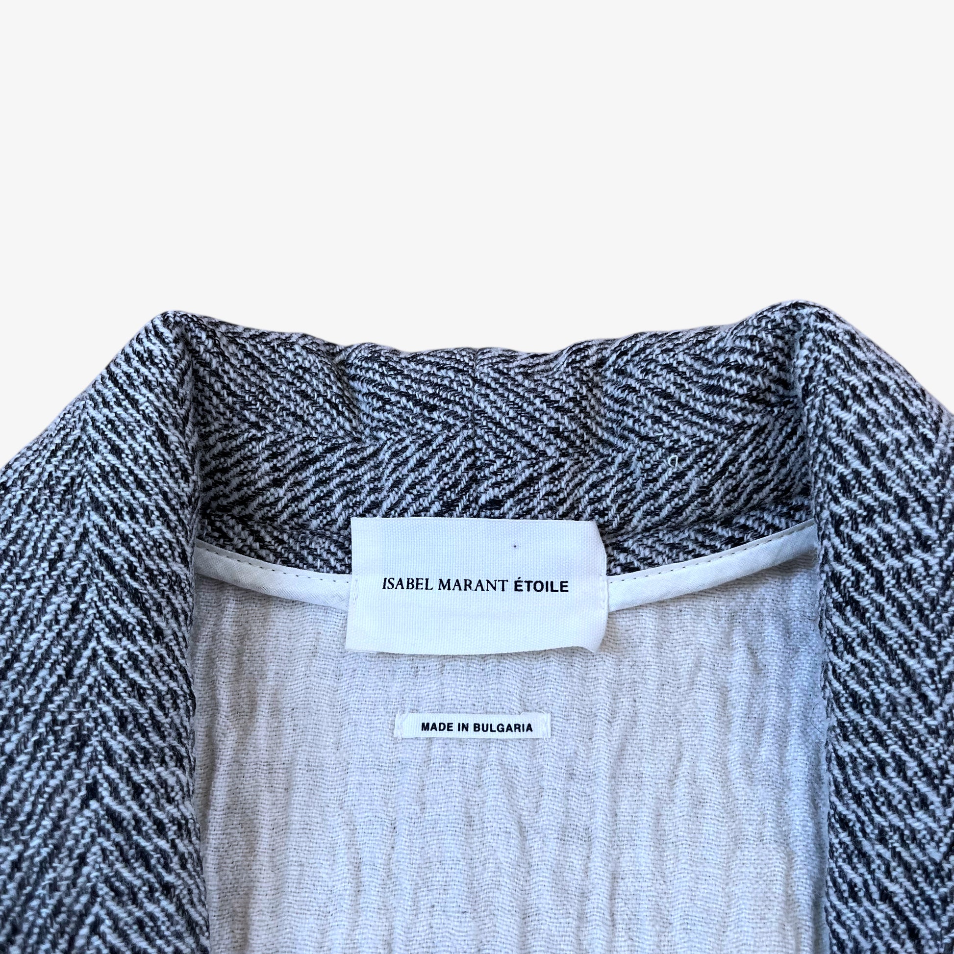 Isabel Marant Étoile label stitched inside of vintage Y2K women's Edilon herringbone wool blend tweed coat.