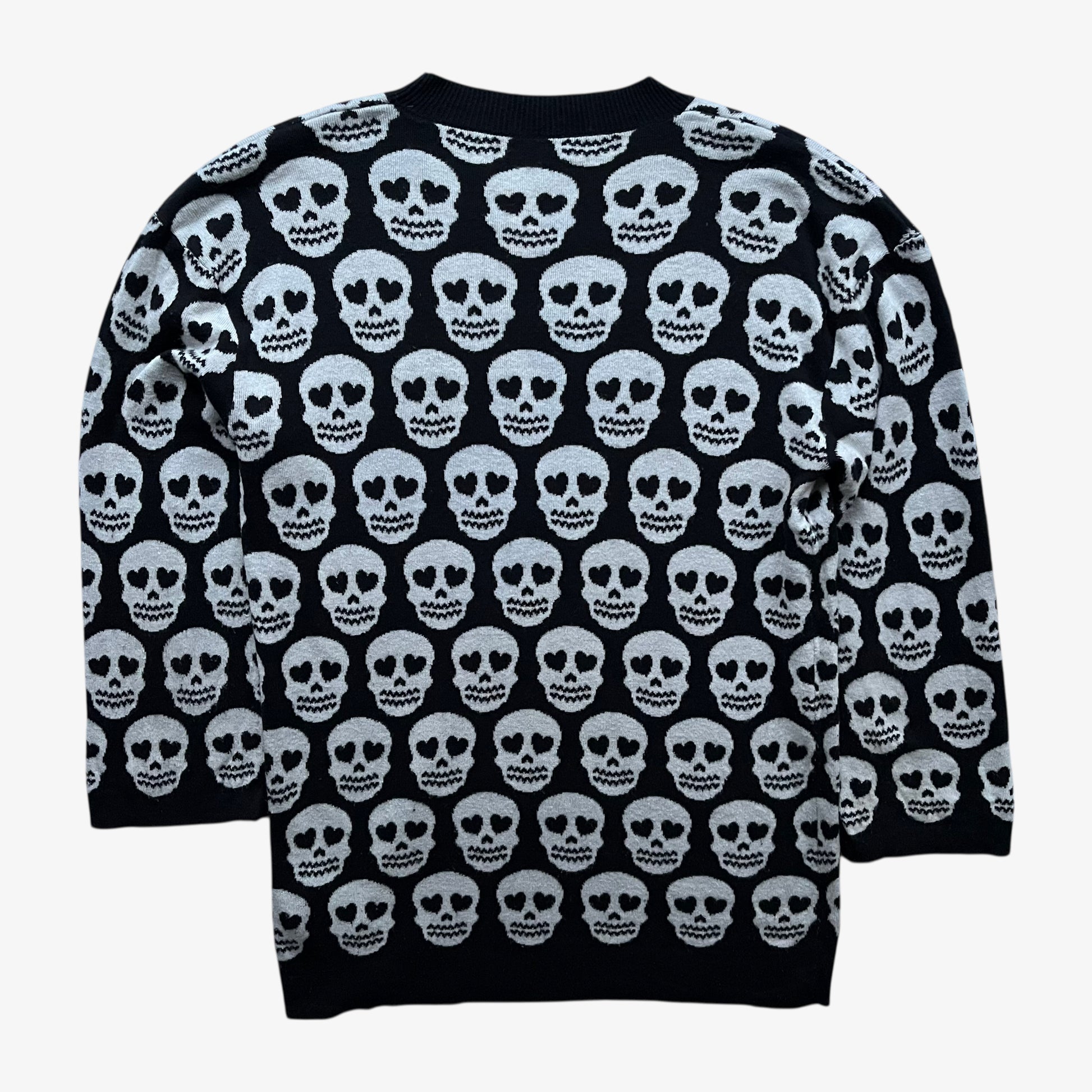 Back of women's vintage Y2K Love Moschino geometric skull print black wool blend jumper.