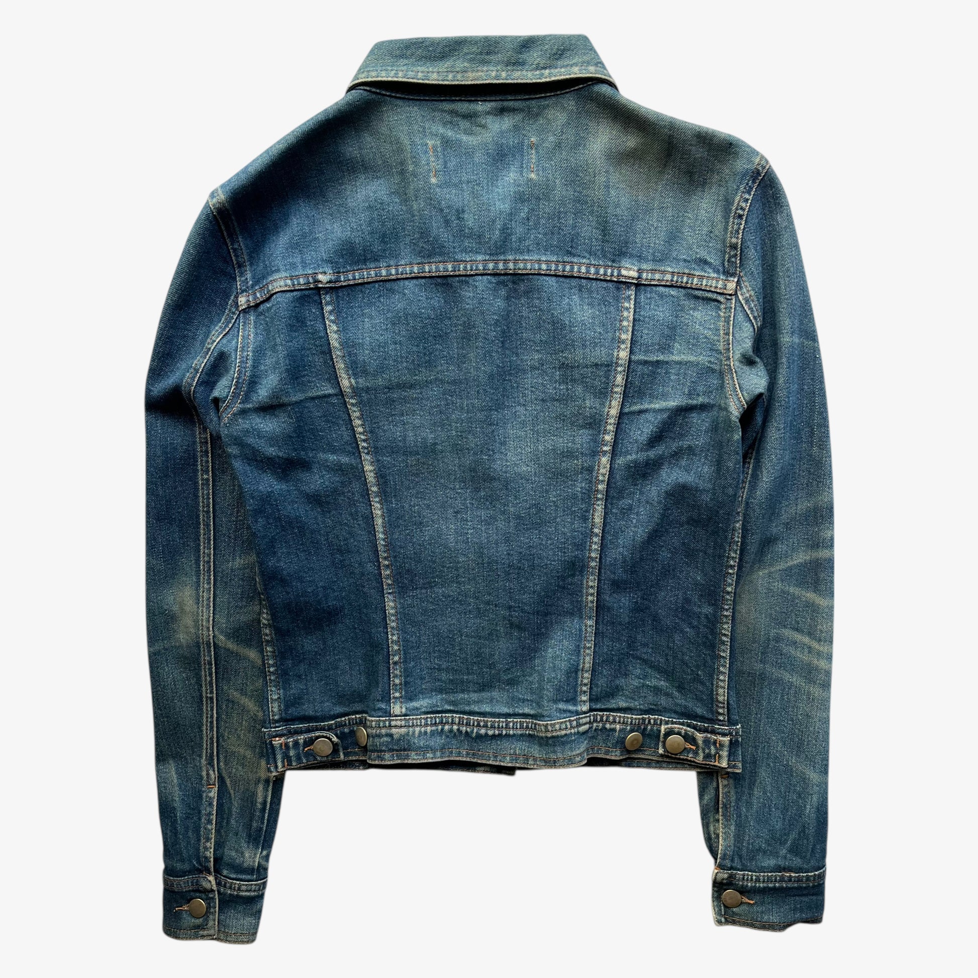 Back of vintage Y2K women's Moschino jeans blue denim trucker jacket.
