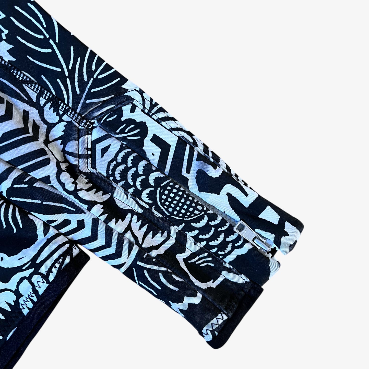 Cuff of vintage Y2K women's Roberto Cavalli Freedom abstract floral print black jacket.