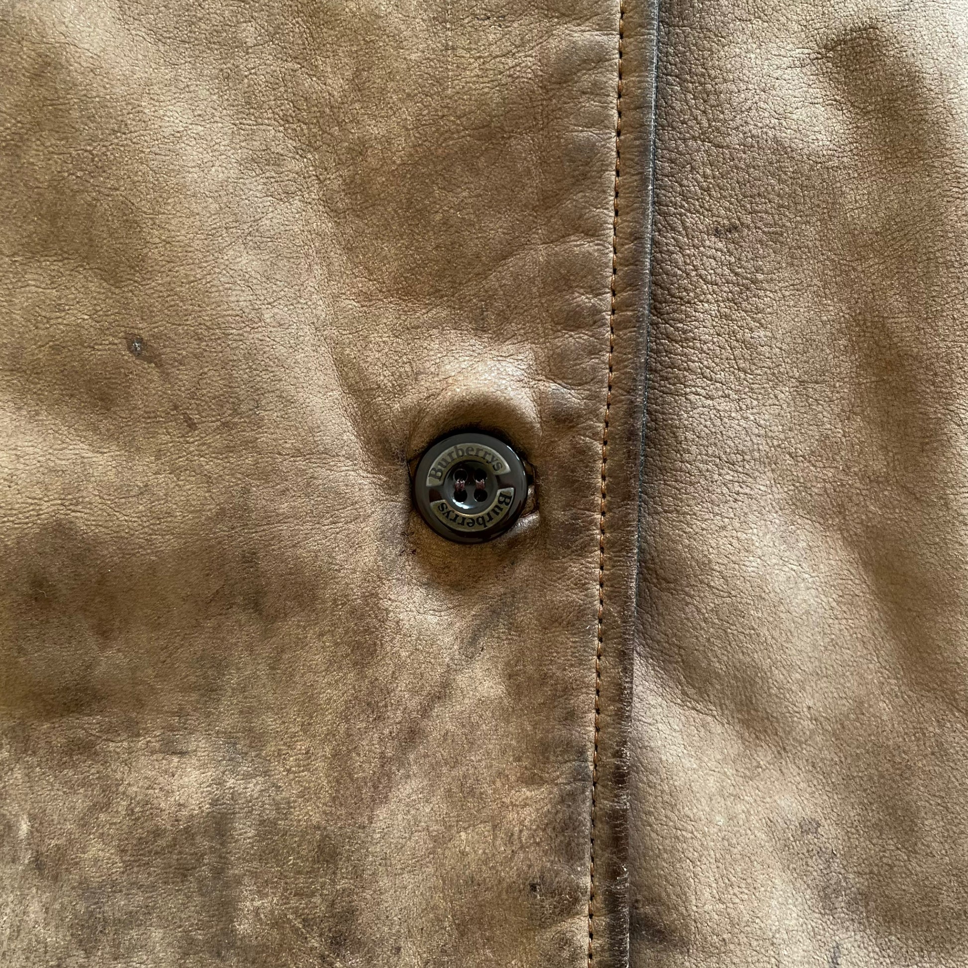 Vintage 1980s Womens Burberry Brown Leather Jacket With Black Trim & Nova Check Lining Button - Casspios Dream