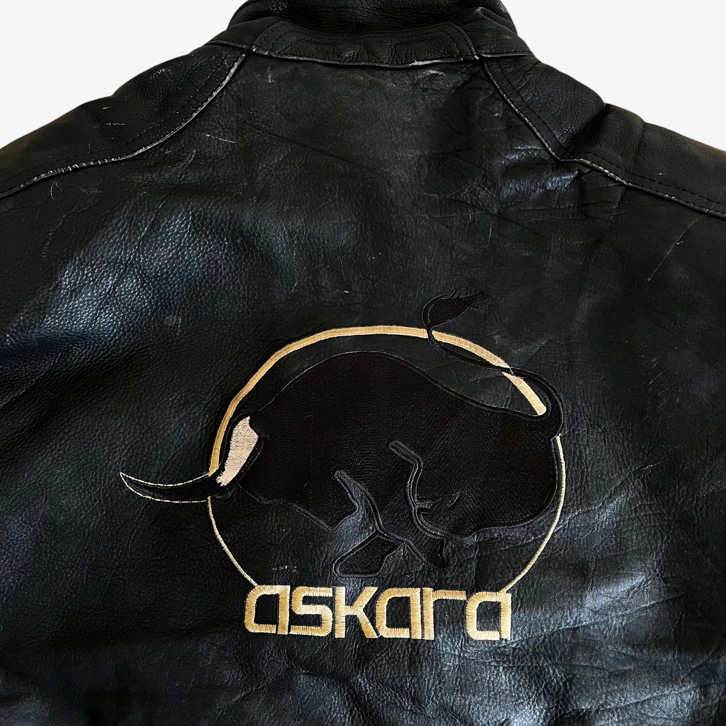 Vintage 90s Askara Paris Black Leather Biker Jacket With Big Back Embroidered Bull Spell Out - Casspios Dream