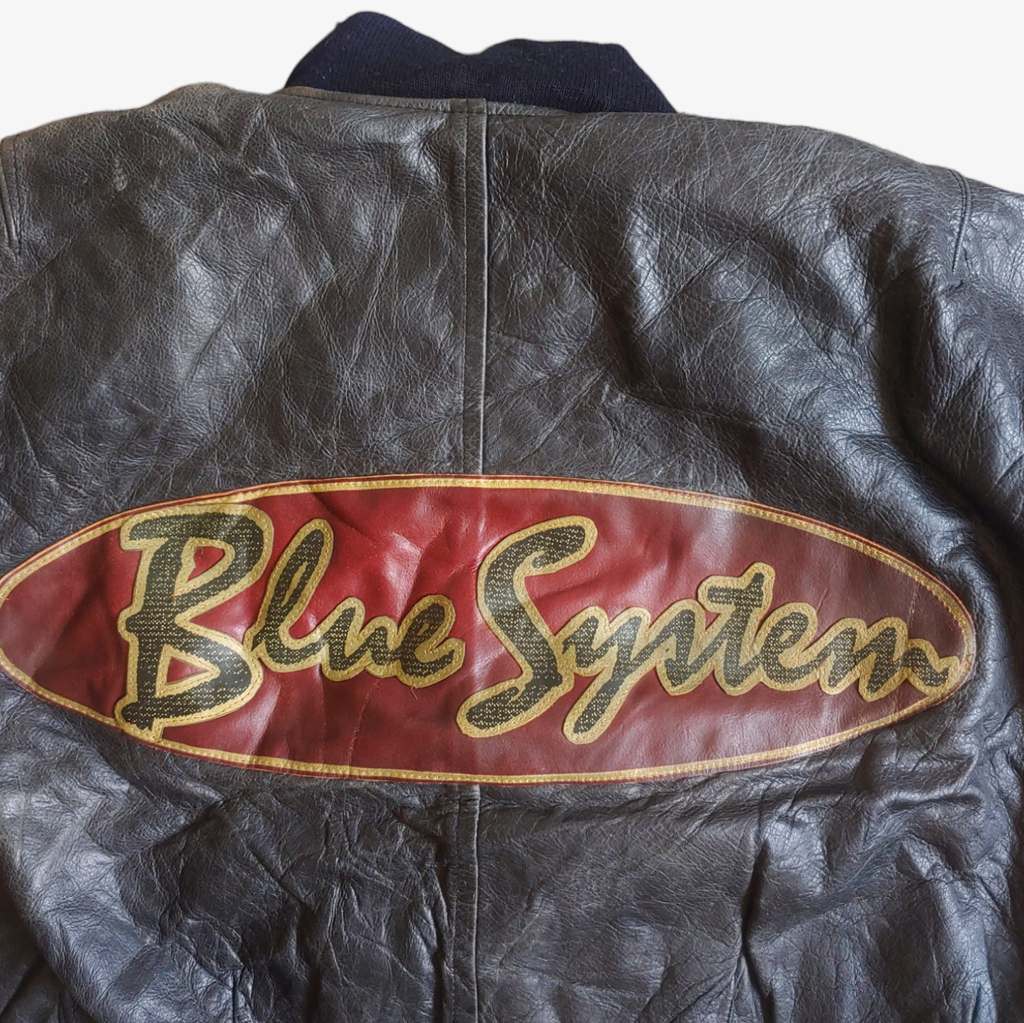 Vintage 90s Blue System Black Leather Racing Biker Jacket Back Logo - Casspios Dream