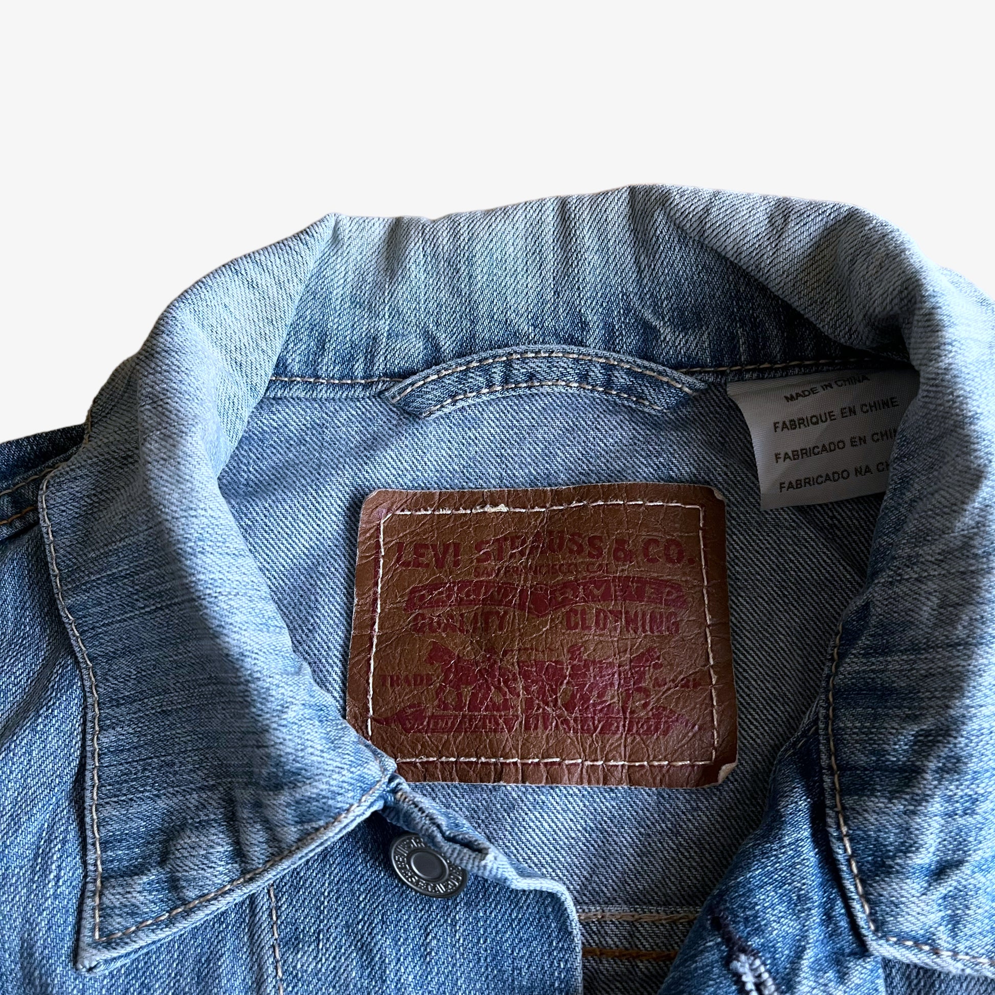 Vintage 90s Levis Jesus Christ Has My Back Embroidered Blue Denim Trucker Jacket Label - Casspios Dream