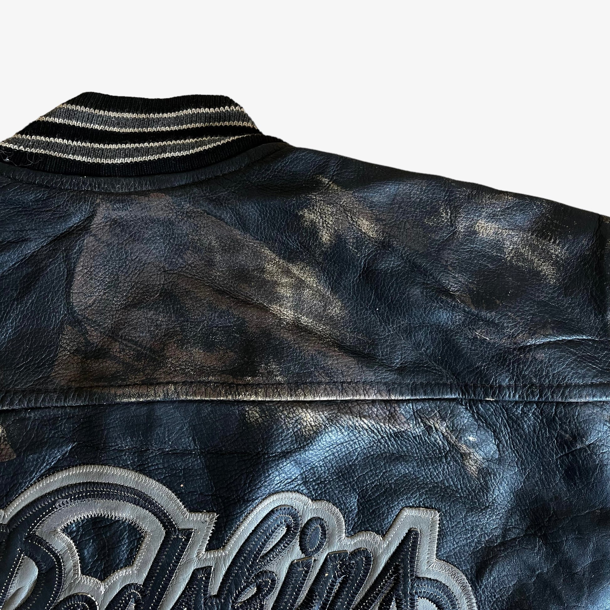 Vintage 90s Redskins Black Leather Varsity Jacket With Back Spell Out Shoulder - Casspios Dream