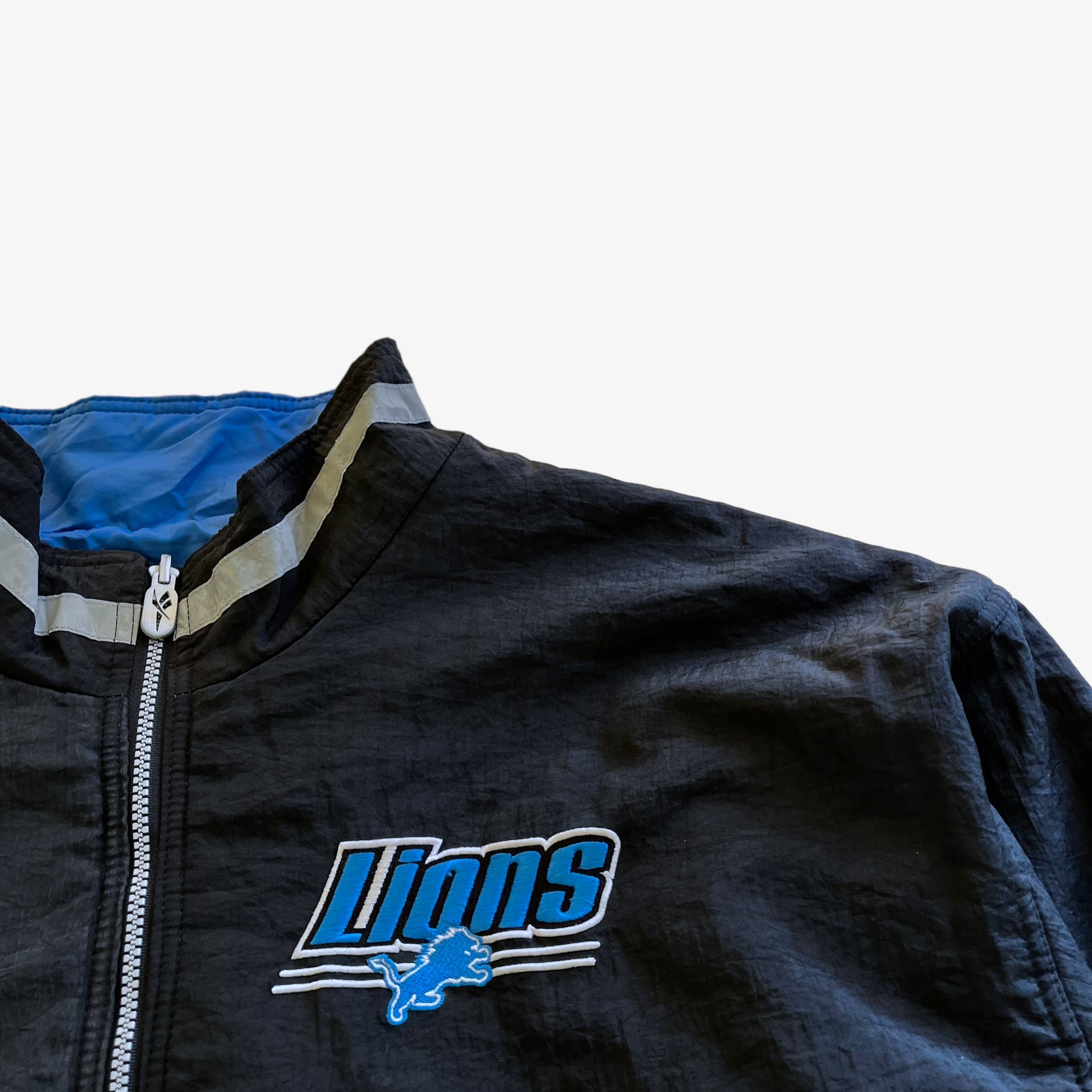 Vintage 90s Reebok NFL Pro Line Detroit Lions Reversible Jacket With Back Spell Out Logo - Casspios Dream