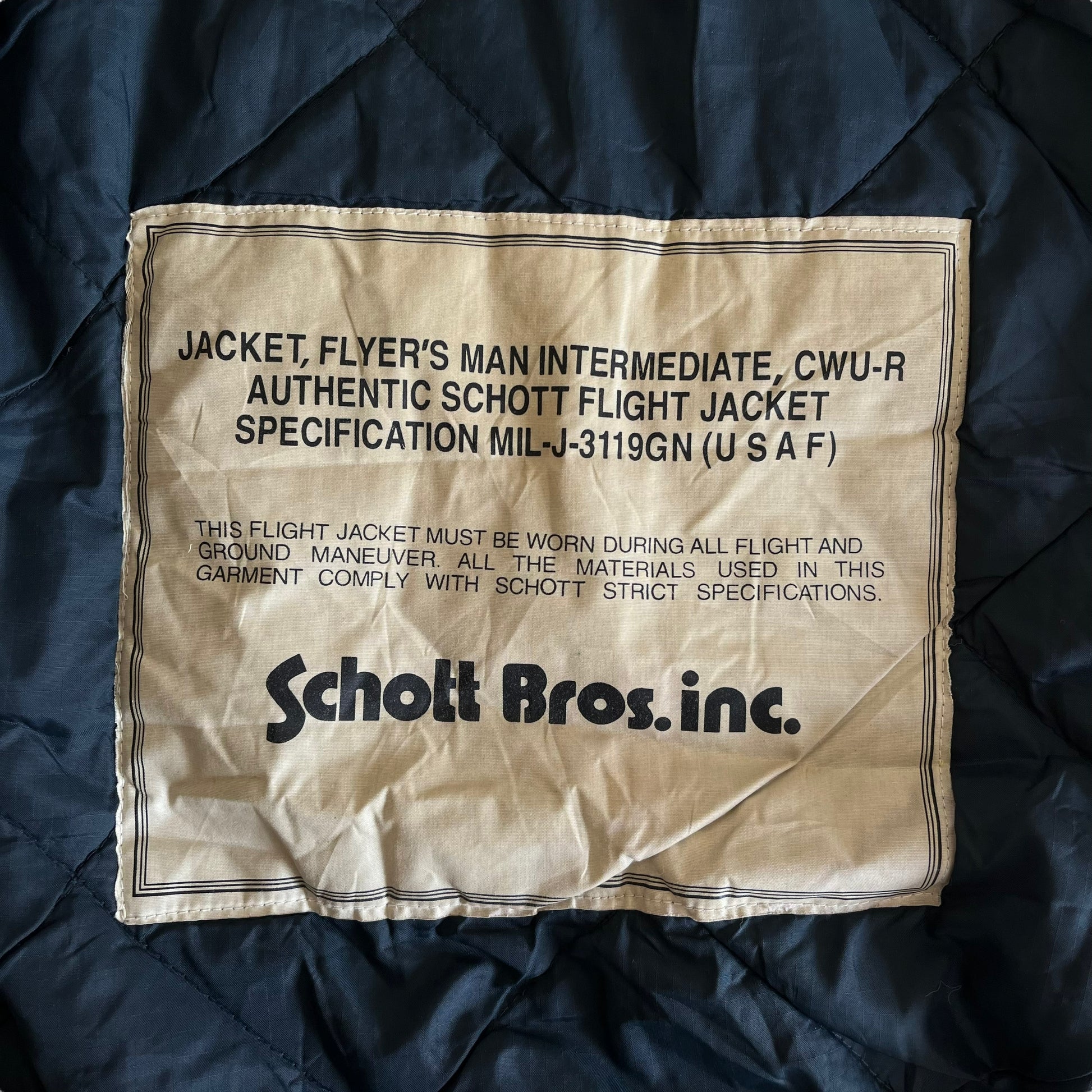 Vintage 90s Schott DuPont Hollofil Type CWU-R Navy Pilot Jacket Inside Label - Casspios Dream