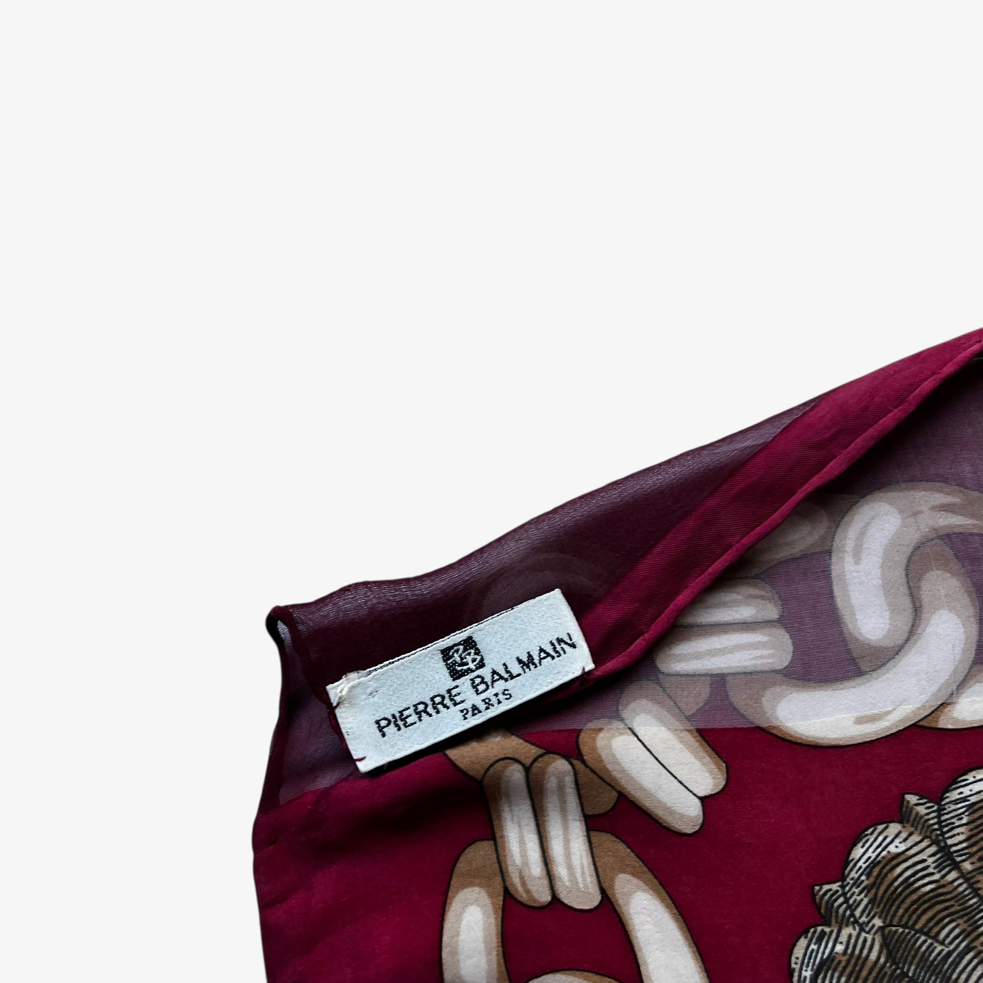 Pierre Balmain Paris label on vintage 80s women's Chong Wa Dae royal medallion chain print red silk scarf.