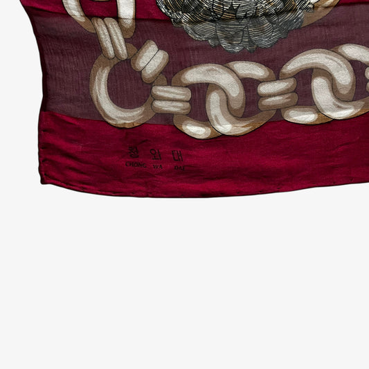 Chong Wa Dae stamp on vintage 80s women's Pierre Balmain royal medallion chain print red silk scarf.